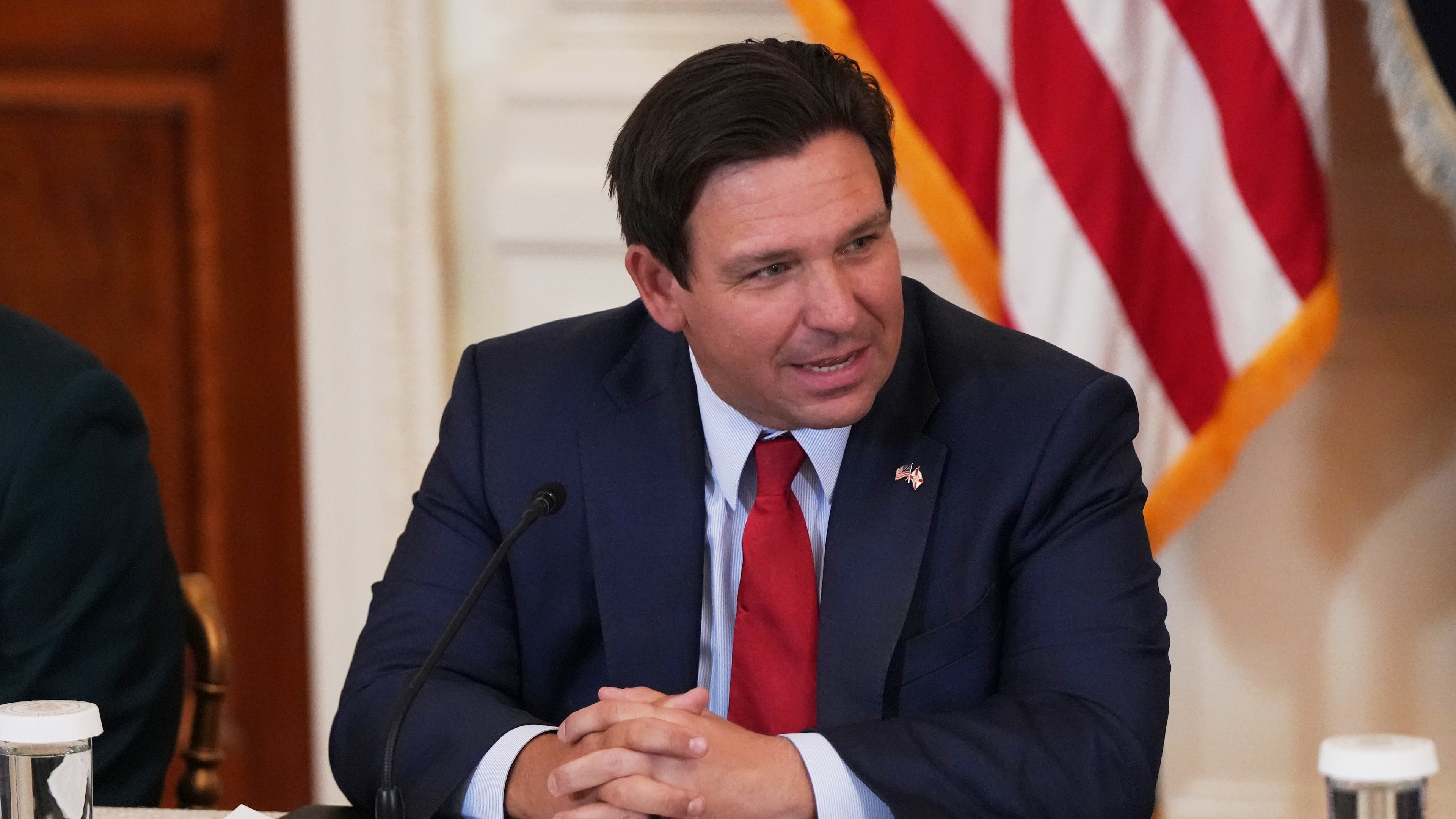 FILE - Florida Gov. Ron DeSantis is seen before a roundtable discussion on college sports in the East Room of the White House, Friday, March 6, 2026, in Washington. (AP Photo/Julia Demaree Nikhinson, File)