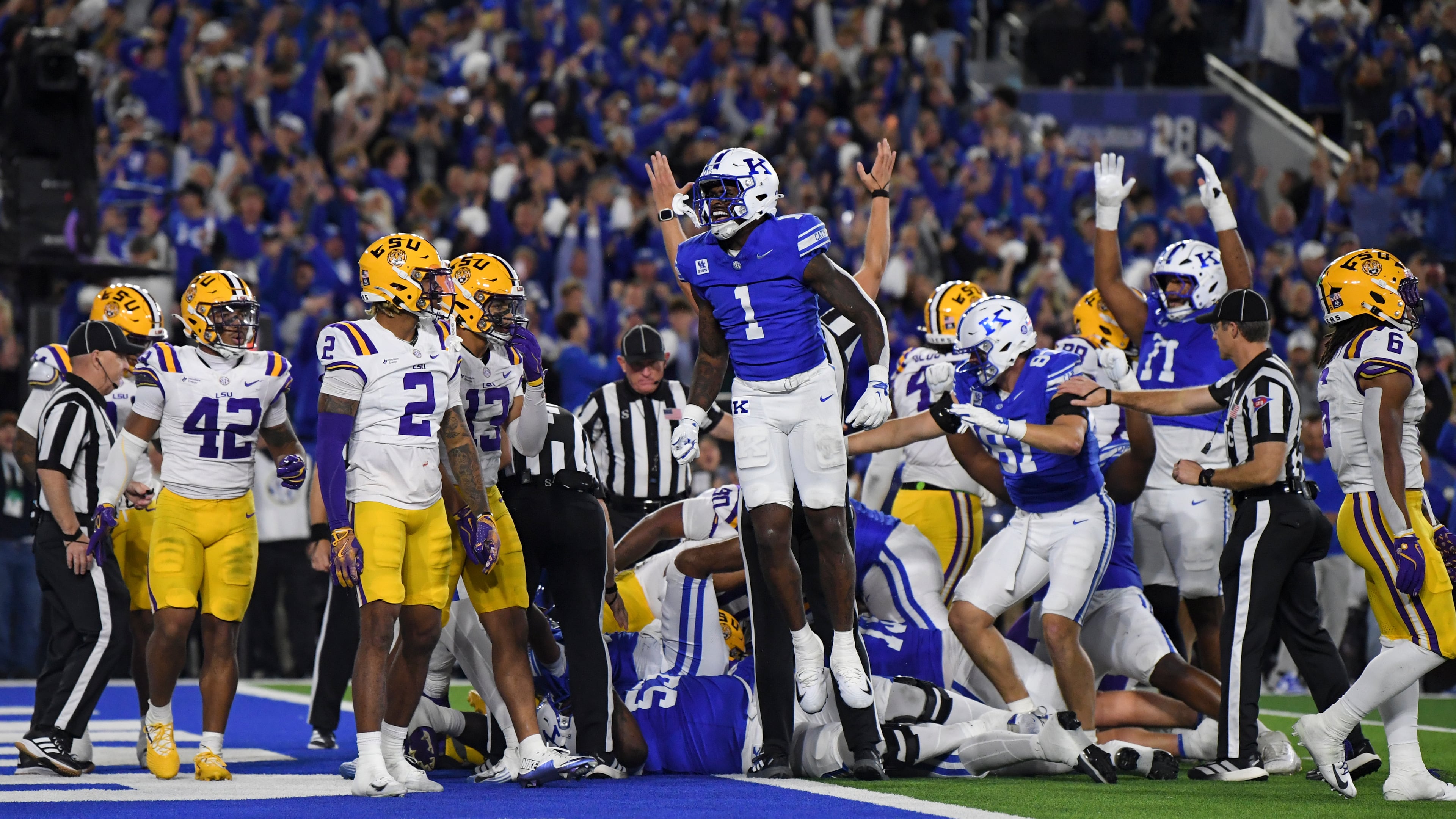 Kentucky running back CJ Baxter (1) reacts after a touchdown against LSU during the first half of an NCCA college football game, Saturday, Oct. 10, 2026, in Lexington, Ky. (AP Photo/Tanner Pearson)