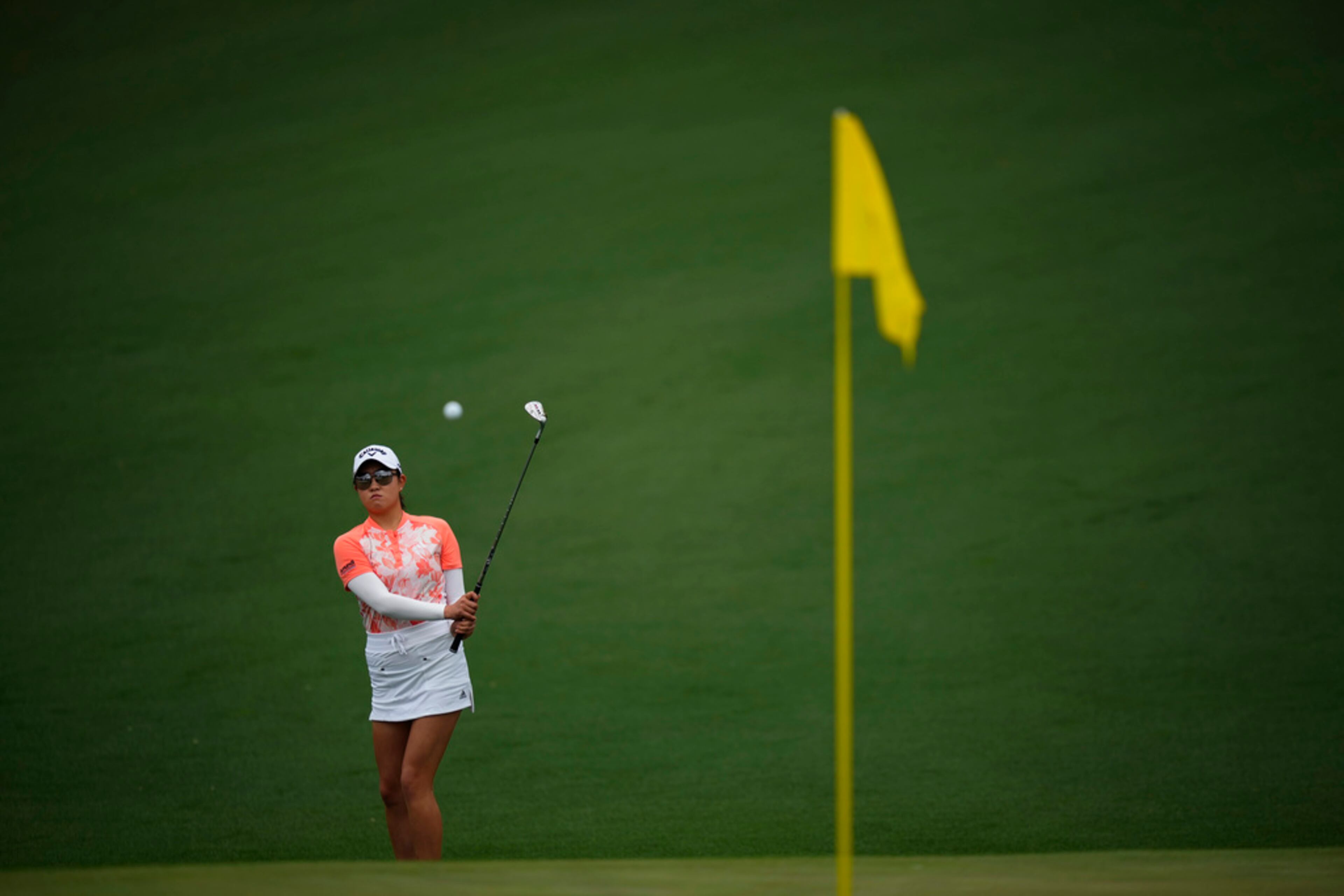 Rose Zhang watches her shot on the second hole during the final round of the Augusta National Women's Amateur golf tournament, Saturday, April 1, 2023, in Augusta, Ga. (AP Photo/Matt Slocum)