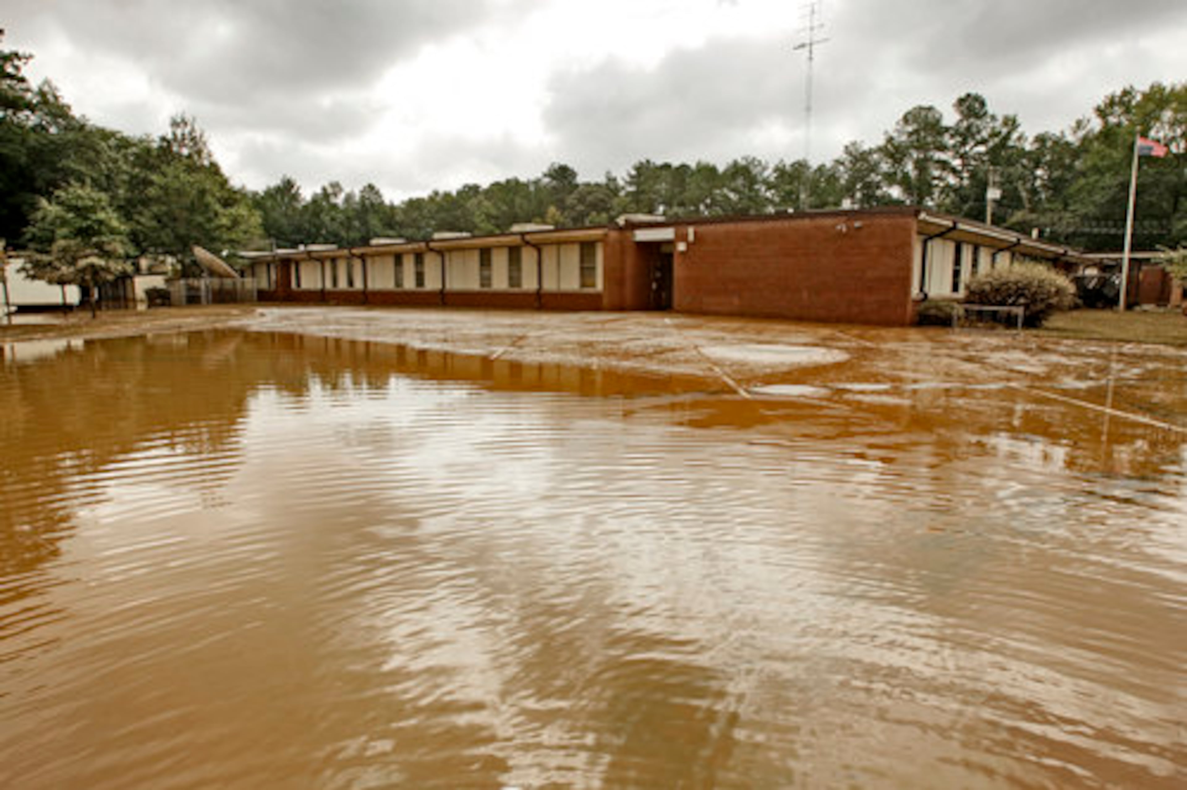 Waters still surround Clarkdale Elementary School in Austell, but they receded enough for officials to take a look inside at the damage.