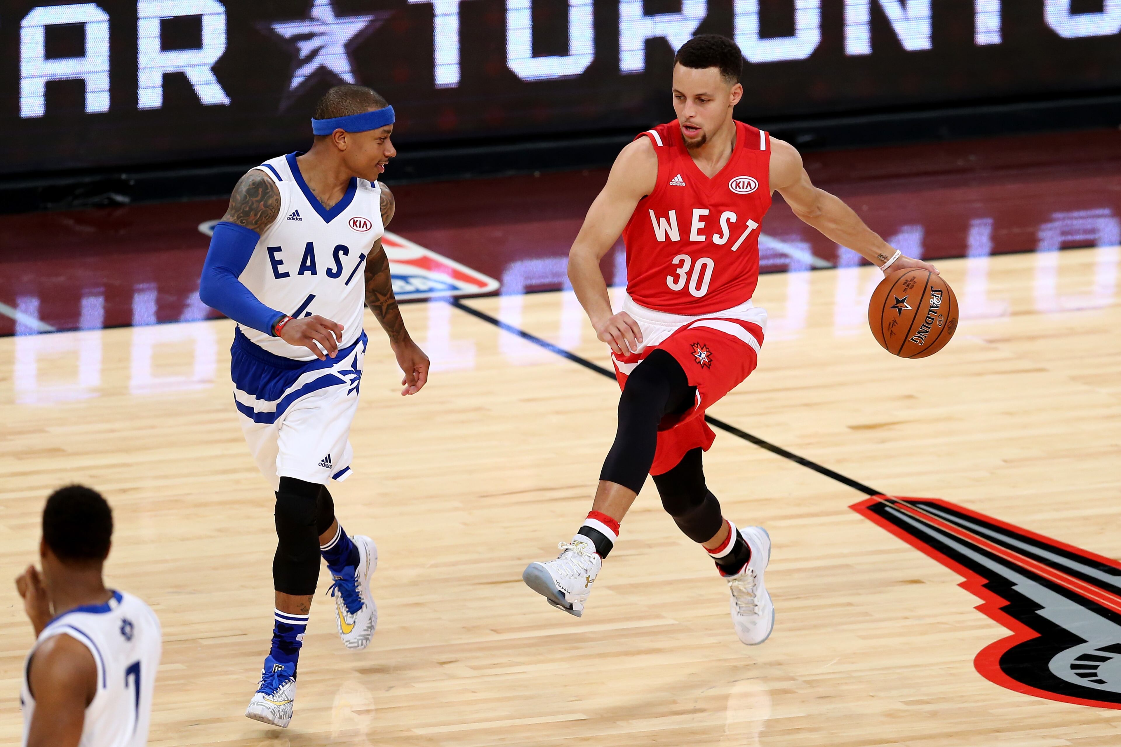Stephen Curry #30 of the Golden State Warriors and the Western Conference handles the ball against Isaiah Thomas #4 of the Boston Celtics and the Eastern Conference in the second half during the NBA All-Star Game 2016 at the Air Canada Centre on February 14, 2016 in Toronto, Ontario. (Photo by Vaughn Ridley/Getty Images)