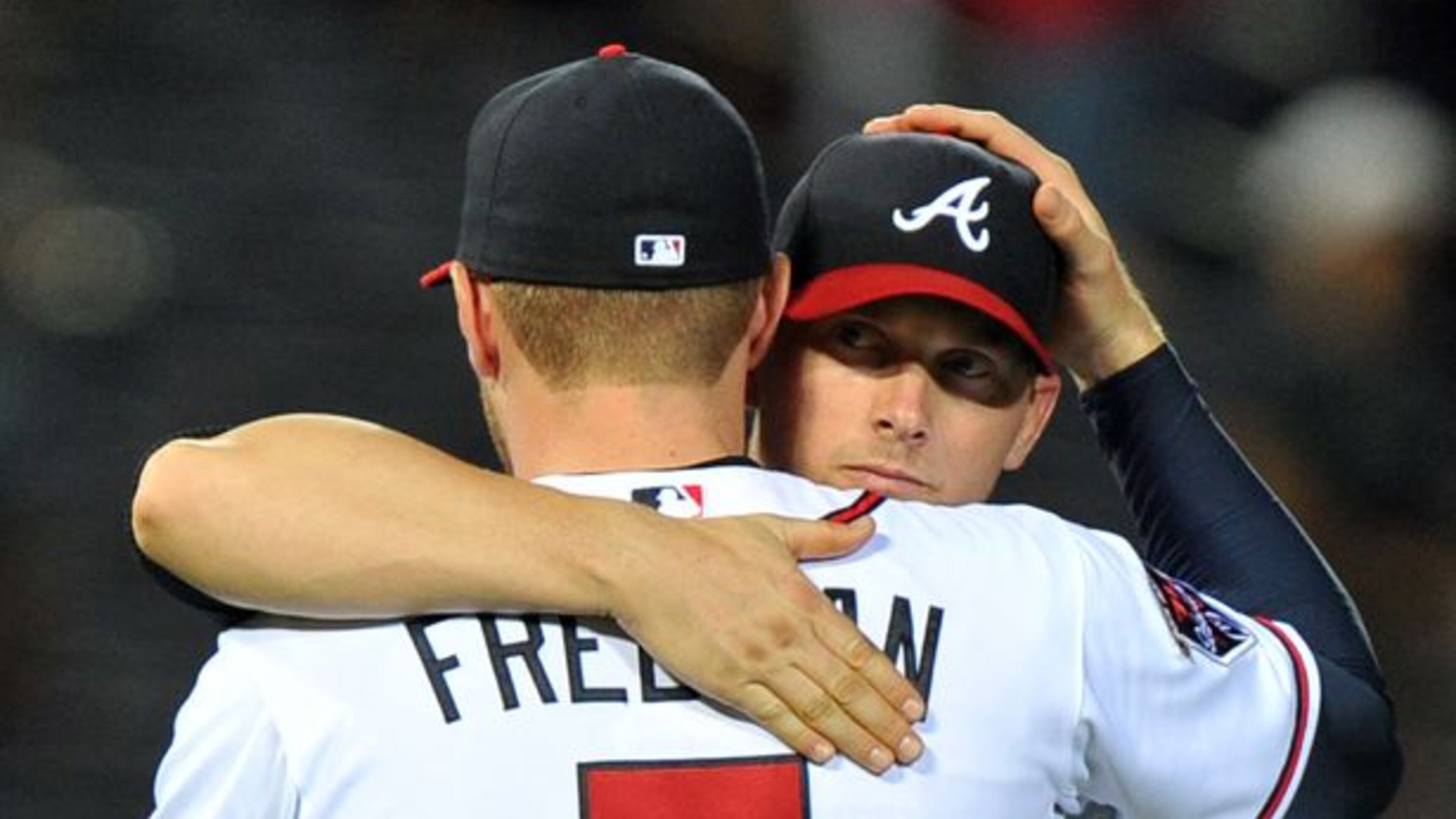 After seven consecutive losses, the Braves finally had something to celebrate Tuesday. Freddie Freeman hugged Chris Johnson, who had the game-winning RBI.