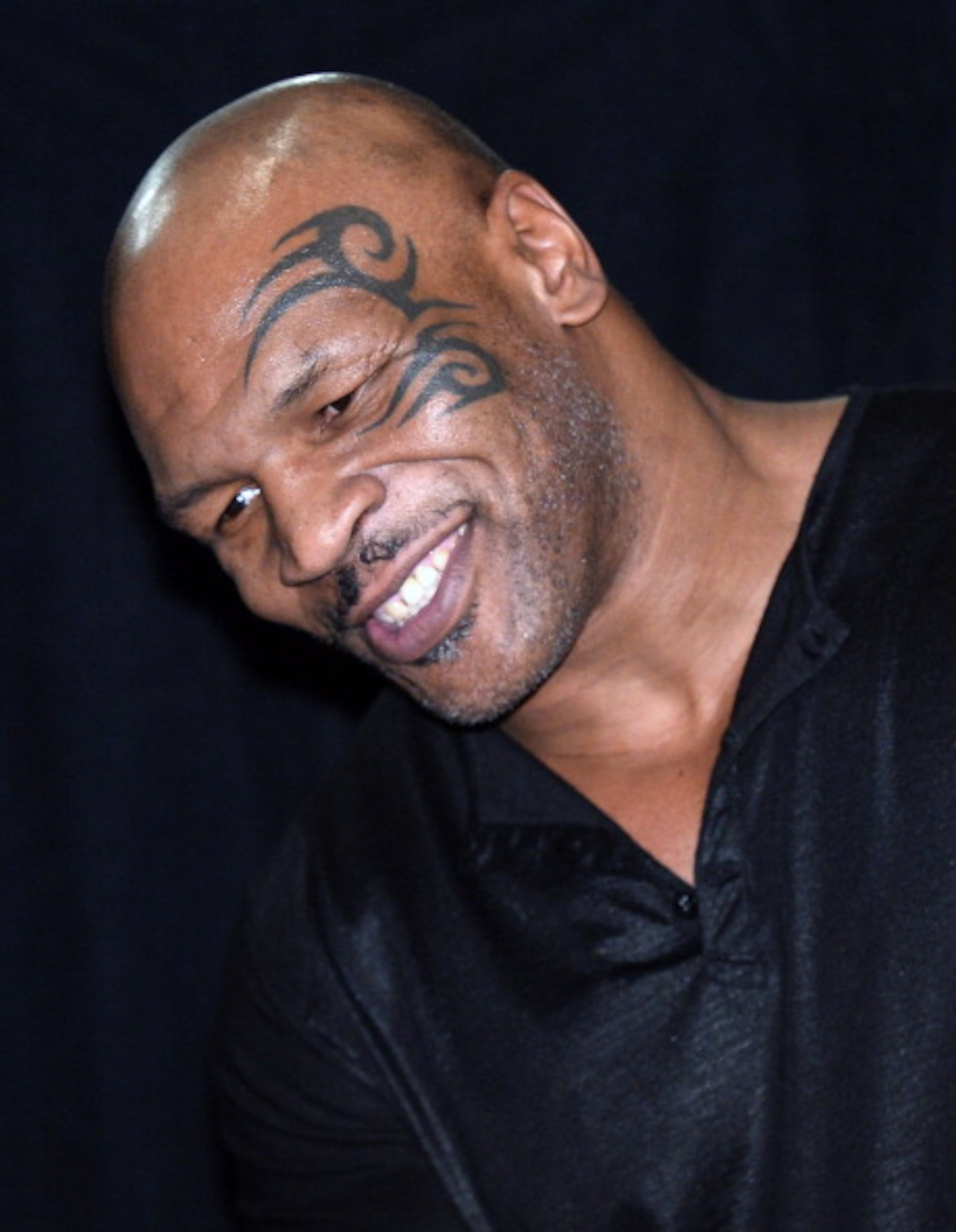 LAS VEGAS, NV - OCTOBER 11: Former boxer Mike Tyson attends the official weigh-in for the fight between WBO welterweight champion Timothy Bradley Jr. and Juan Manuel Marquez at the Encore Theater at Wynn Las Vegas during the official weigh-in for their fight on October 11, 2013 in Las Vegas, Nevada. Bradley will defend his title against Marquez at the Thomas & Mack Center on October 12. (Photo by Ethan Miller/Getty Images)