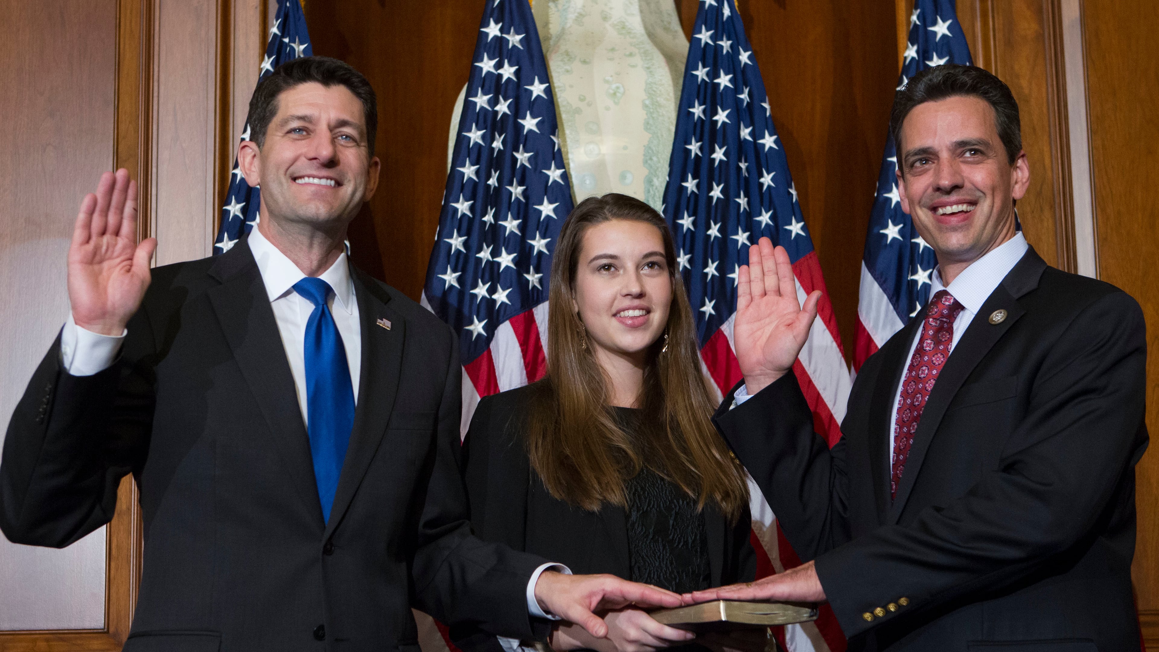House Speaker Paul Ryan of Wis. administers the House oath of office to Rep. Tom Graves, R-Ga., during a mock swearing in ceremony on Capitol Hill in Washington, Tuesday, Jan. 3, 2017, as the 115th Congress began. (AP Photo/Jose Luis Magana)