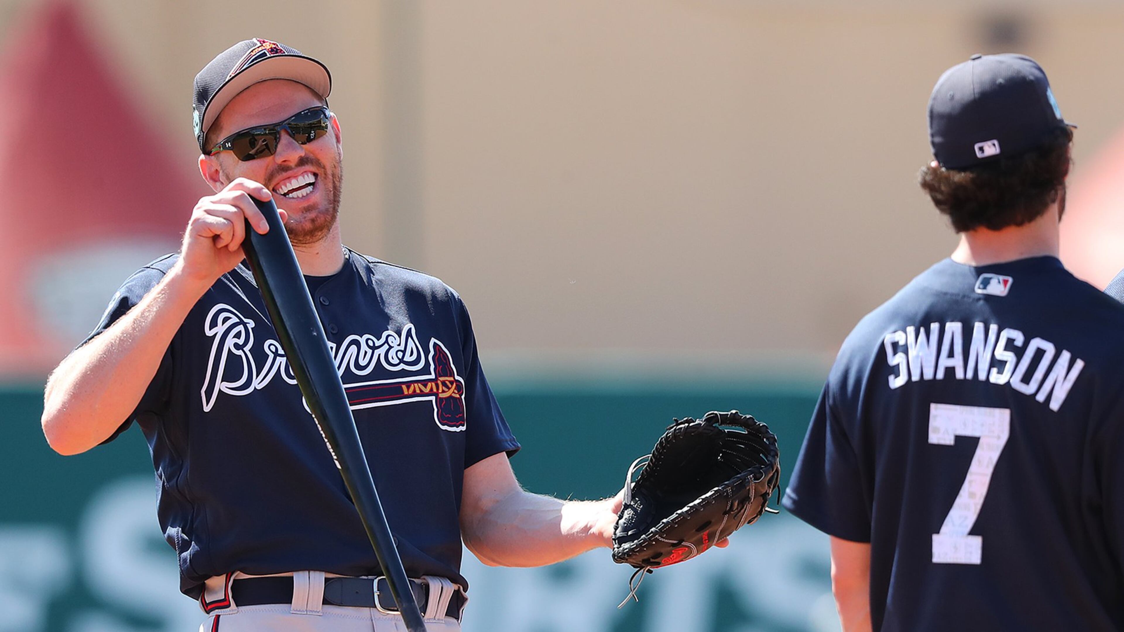 Freddie Freeman shares a laugh with Dansby Swanson during a Feb. 20 workout. Freeman returned to the lineup Wednesday after missing 1 1/2 weeks while at the World Baseball Classic. Swanson has been out since March 4 with back tightness. (Curtis Compton/ccompton@ajc.com)