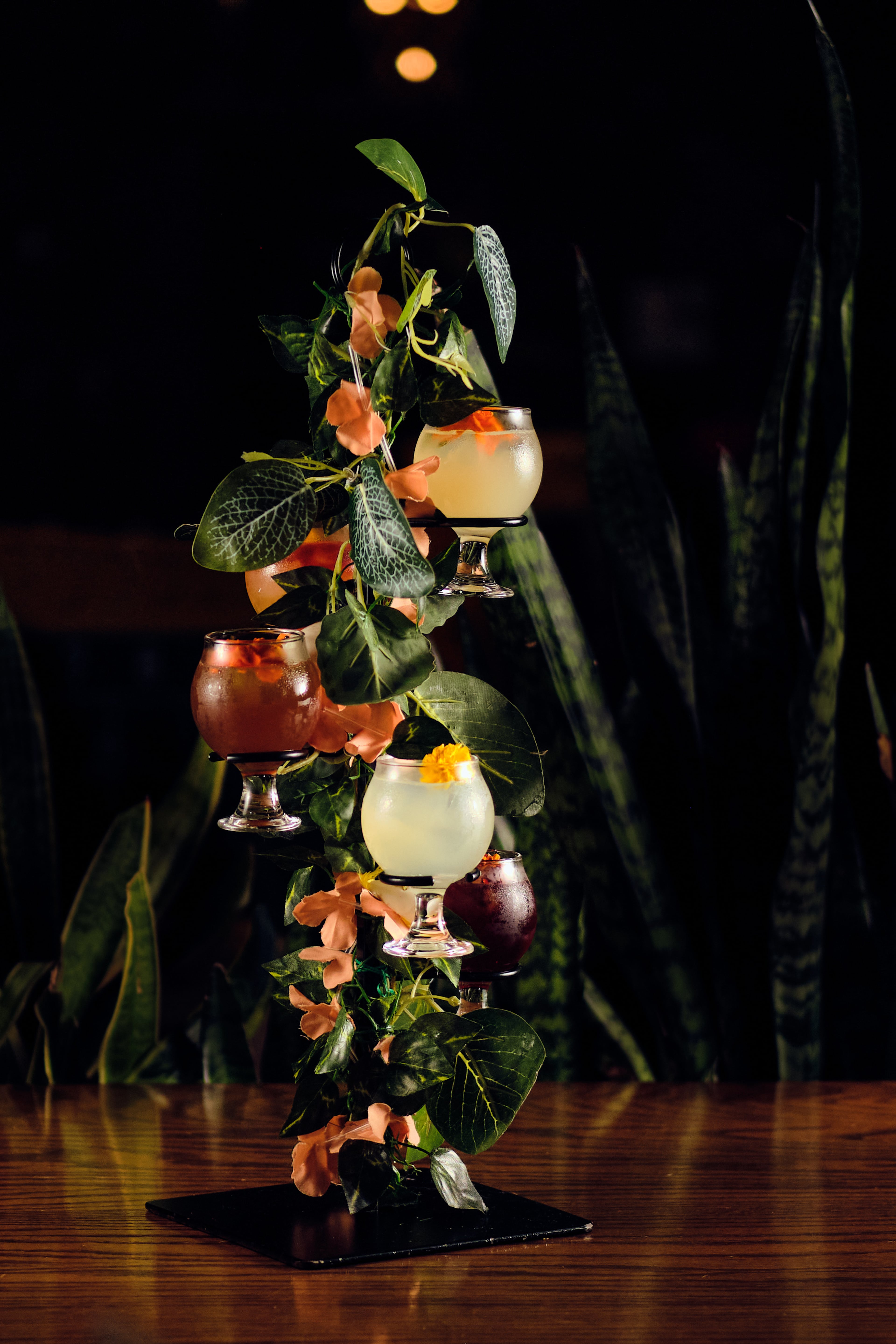 Your 3rd Space offers two ways to enjoy their Mai Tai: As a cocktail or as part of the TR33 sampler with four of their other top cocktails on a tree. (Courtesy of Brandon Amato)