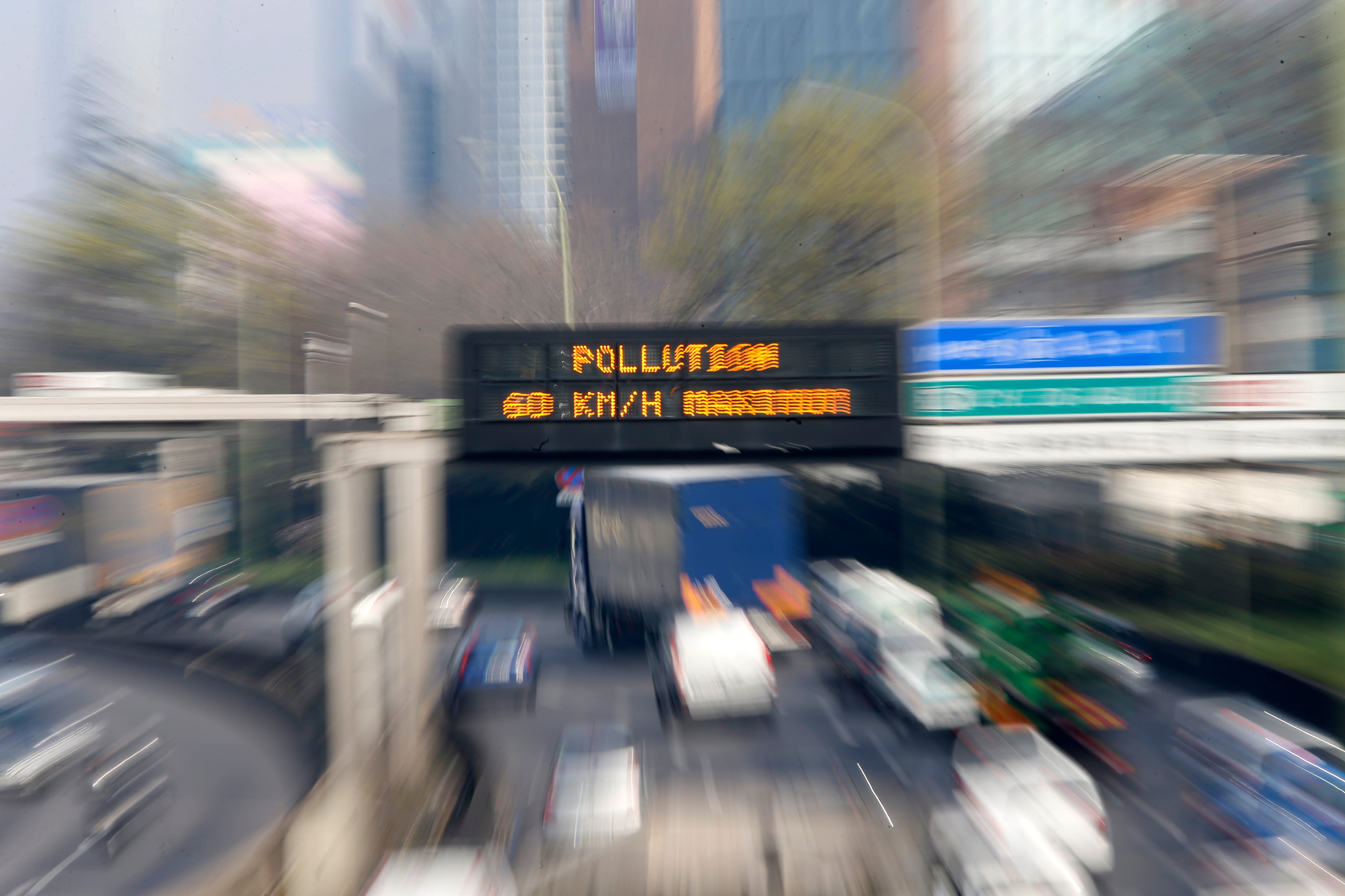 An electronic road sign on the Paris ring road reads "Pollution" Friday March 14, 2014. Air pollution that has turned Paris skies a murky yellow is giving a break to millions of French travelers -- all public transportation in the Paris region and two other cities is free for the next three days. Nearly three-quarters of France is under alert in what the European Environment Agency says is the worst air pollution since 2007.