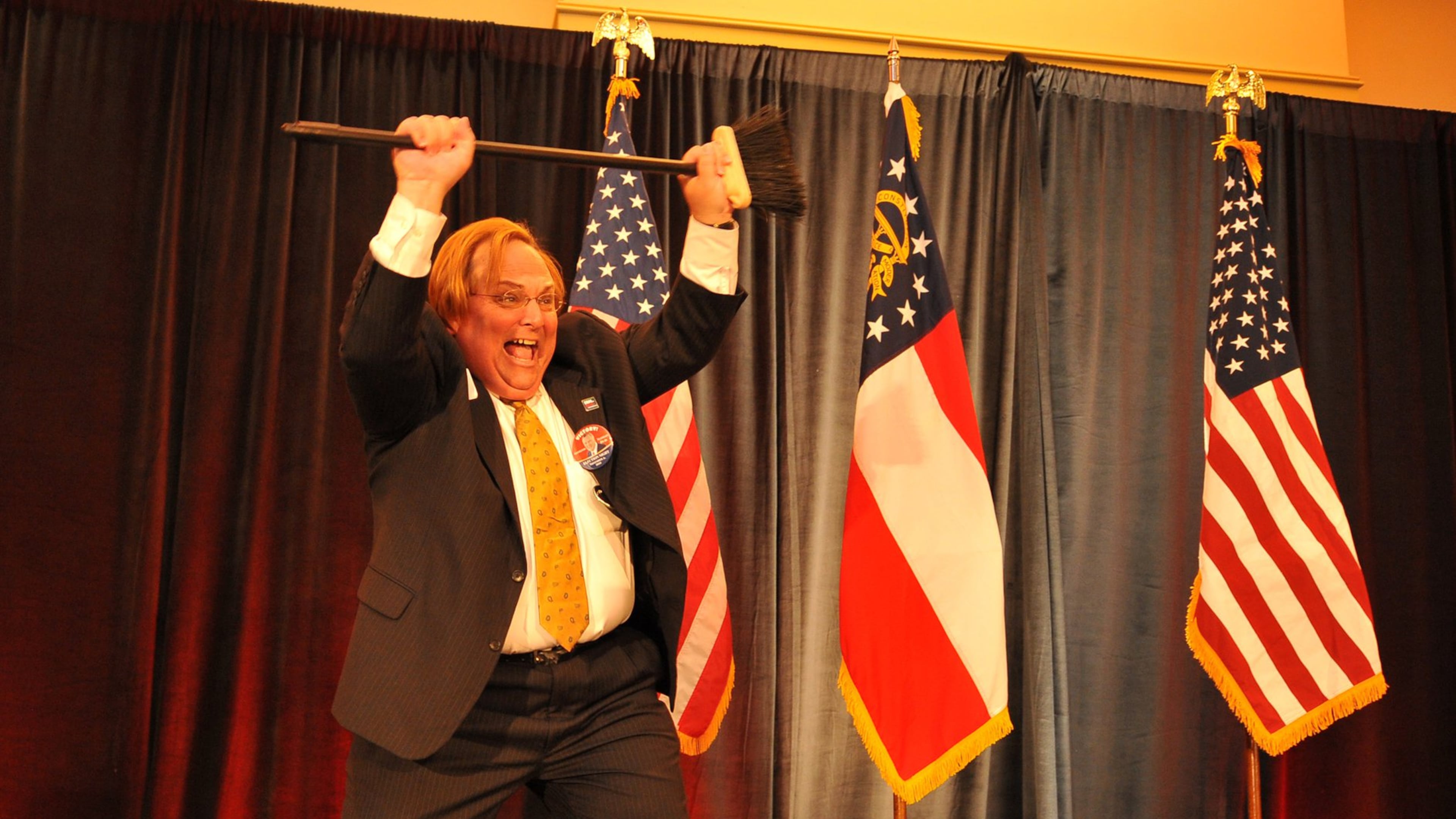 A former Gainesville Times reporter, Harris Blackwood had little in his background suggesting expertise in highway safety before Gov. Nathan Deal put him in charge of that division of his office. Known as an office cutup, he’s seen here claiming a “sweep” for Republicans at a 2010 election night event. BRANT SANDERLIN / AJC