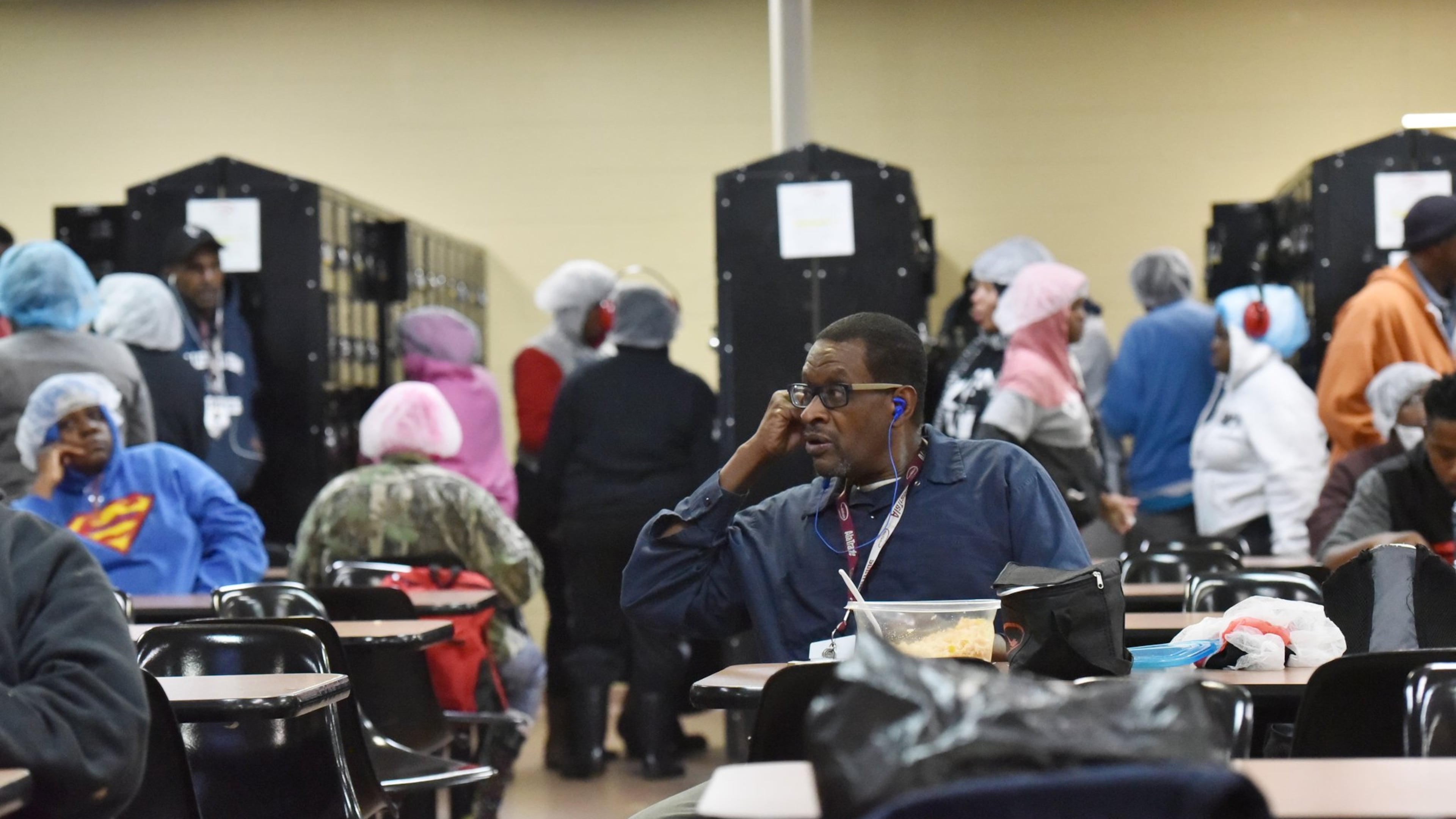December 5, 2018 - Longtime inmate Byron Ferguson talks to his friend on the phone during his lunch break at Alatrade Foods in Phenix City, Ala., where he began working while at a Georgia Department of Corrections transitional center earlier this year. HYOSUB SHIN / HSHIN@AJC.COM