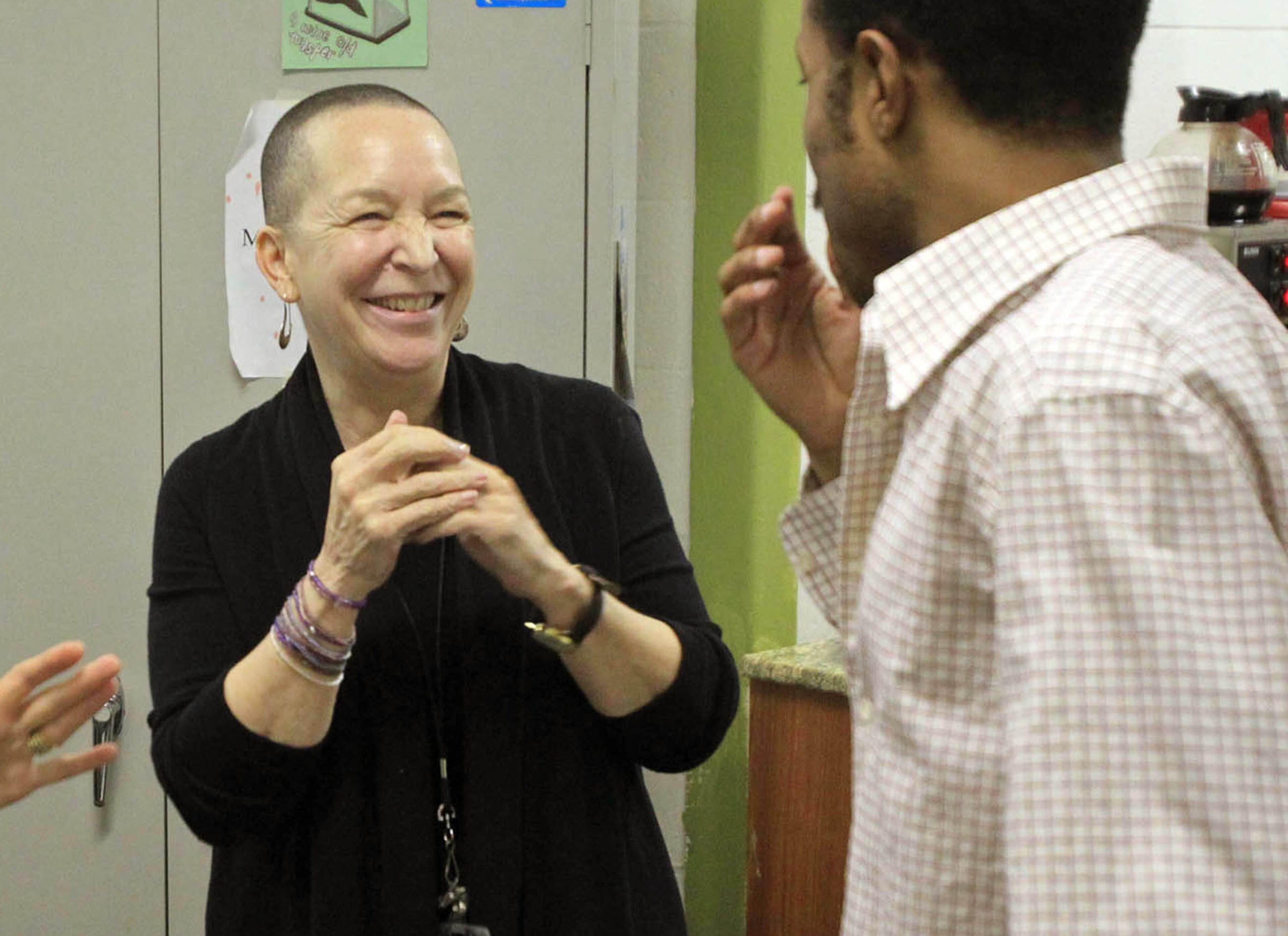 Playwright Pearl Cleage, left, talks with actor Eugene H. Russell IV.