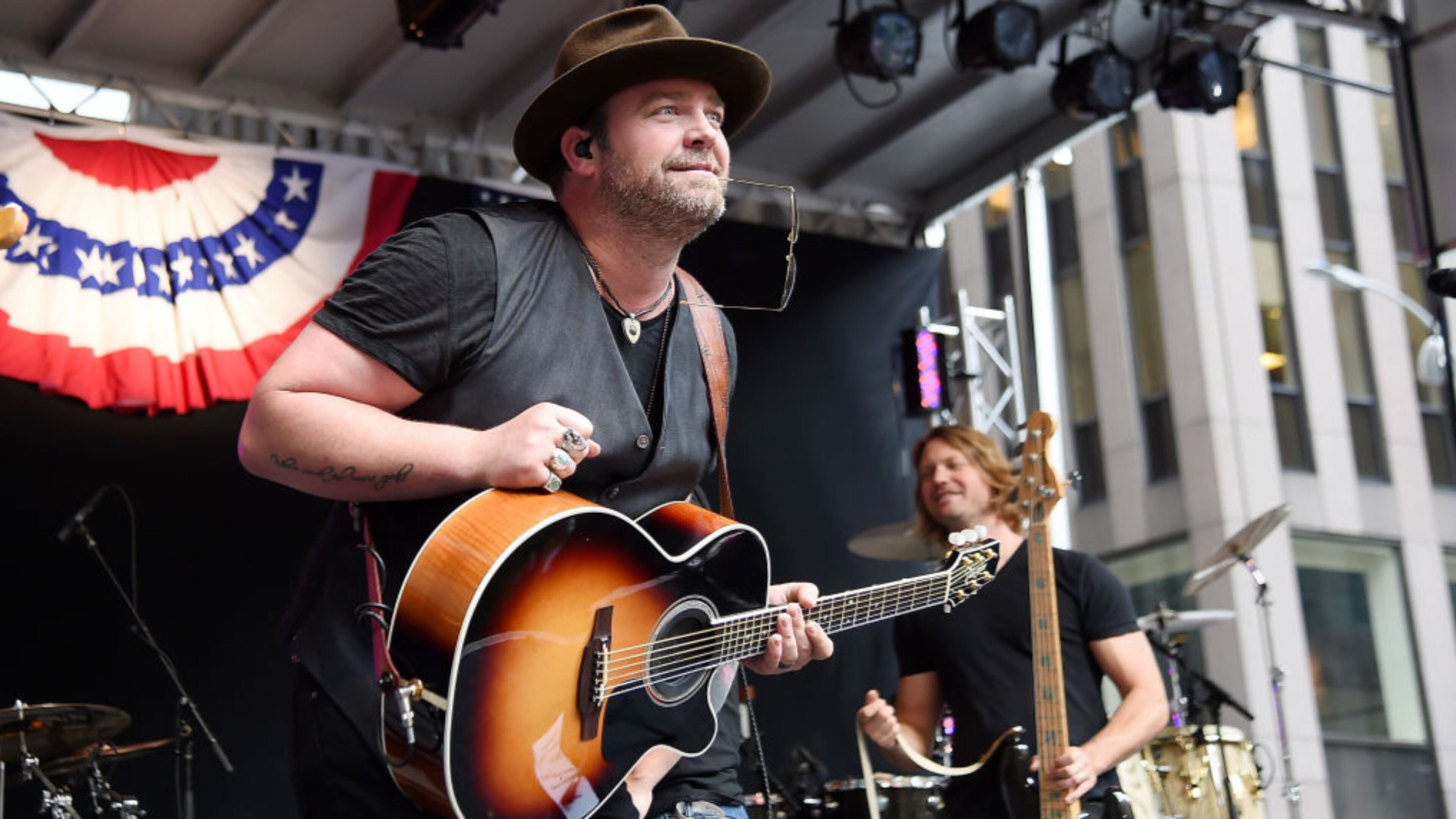 Rodney Parker and Liberty Beach, a country band from Sylvania, Ohio, was booted from an opening slot for Nashville star Lee Brice after complaints over a Facebook post. In this photo, American singer-songwriter Lee Brice performs On Fox & Friends' All-American Summer Concert Series at FOX Studios on June 30, 2017 in New York City. (Photo by Nicholas Hunt/Getty Images)