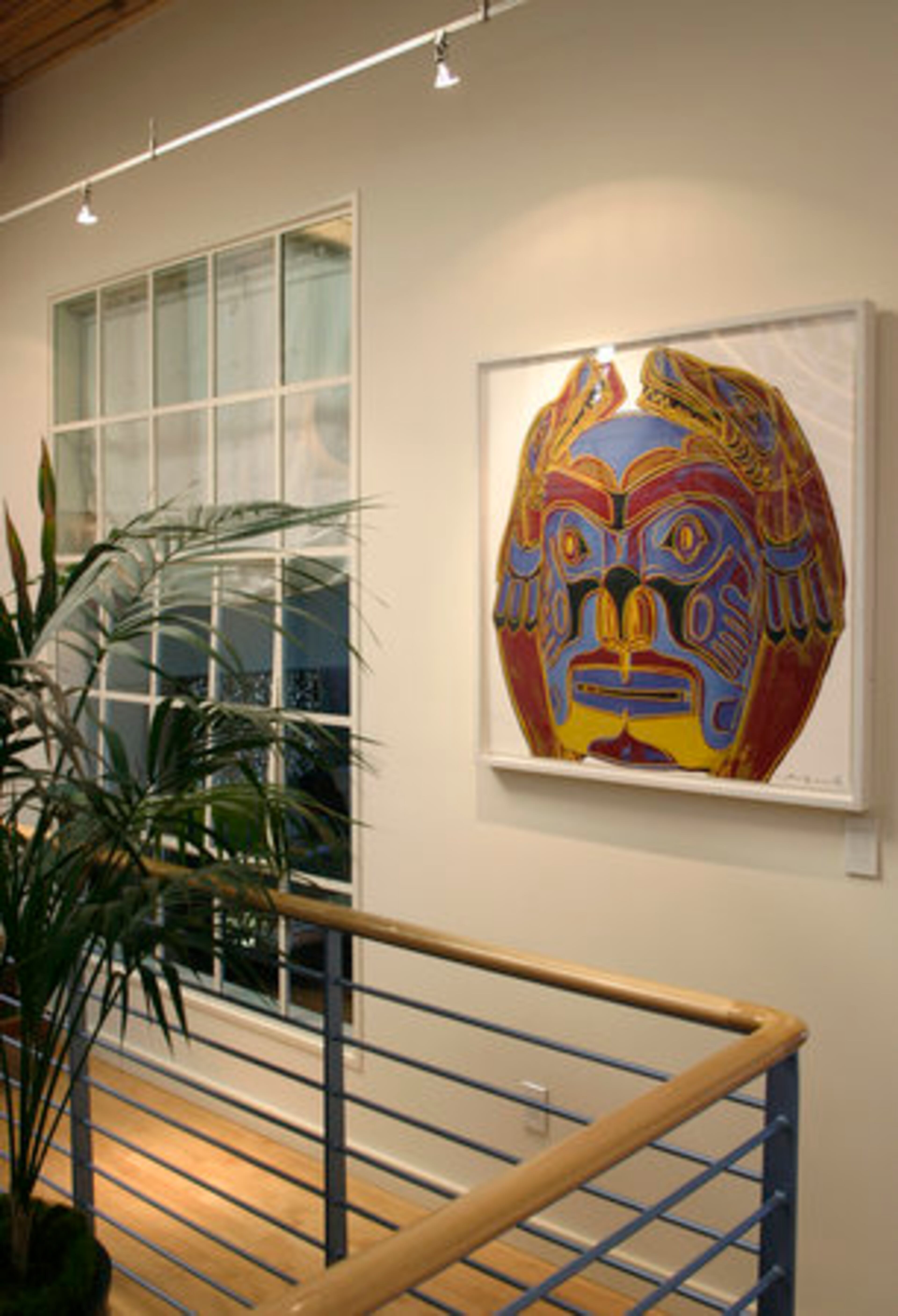 A Native American work by Andy Warhol hangs in the hallway near the entrance to the master bedroom.