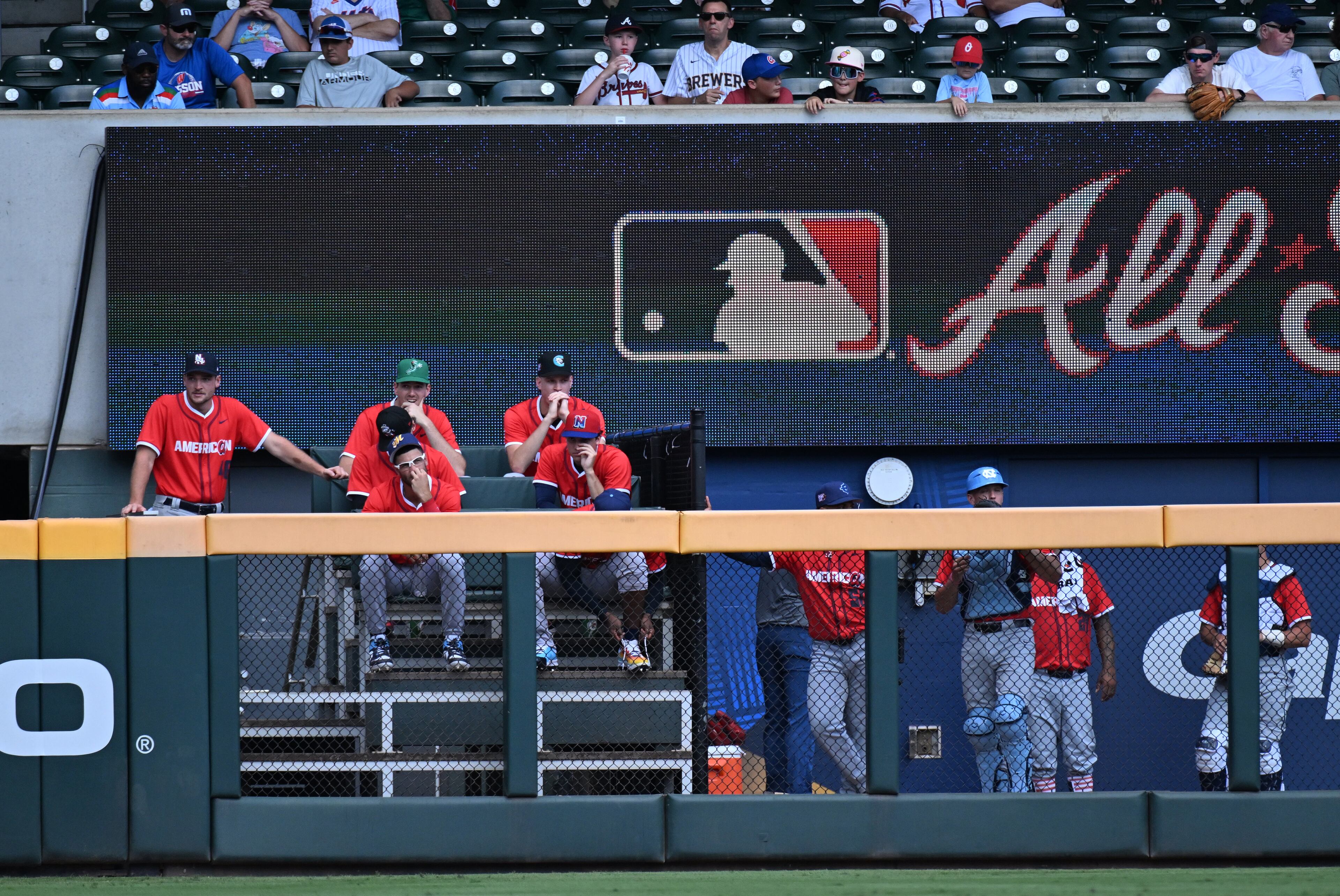 American League players watch from bullpen area during the All-Star Futures Game at Truist Park, Saturday, July 12, 2025, in Atlanta. National League won 4-2 over American League. (Hyosub Shin / AJC)