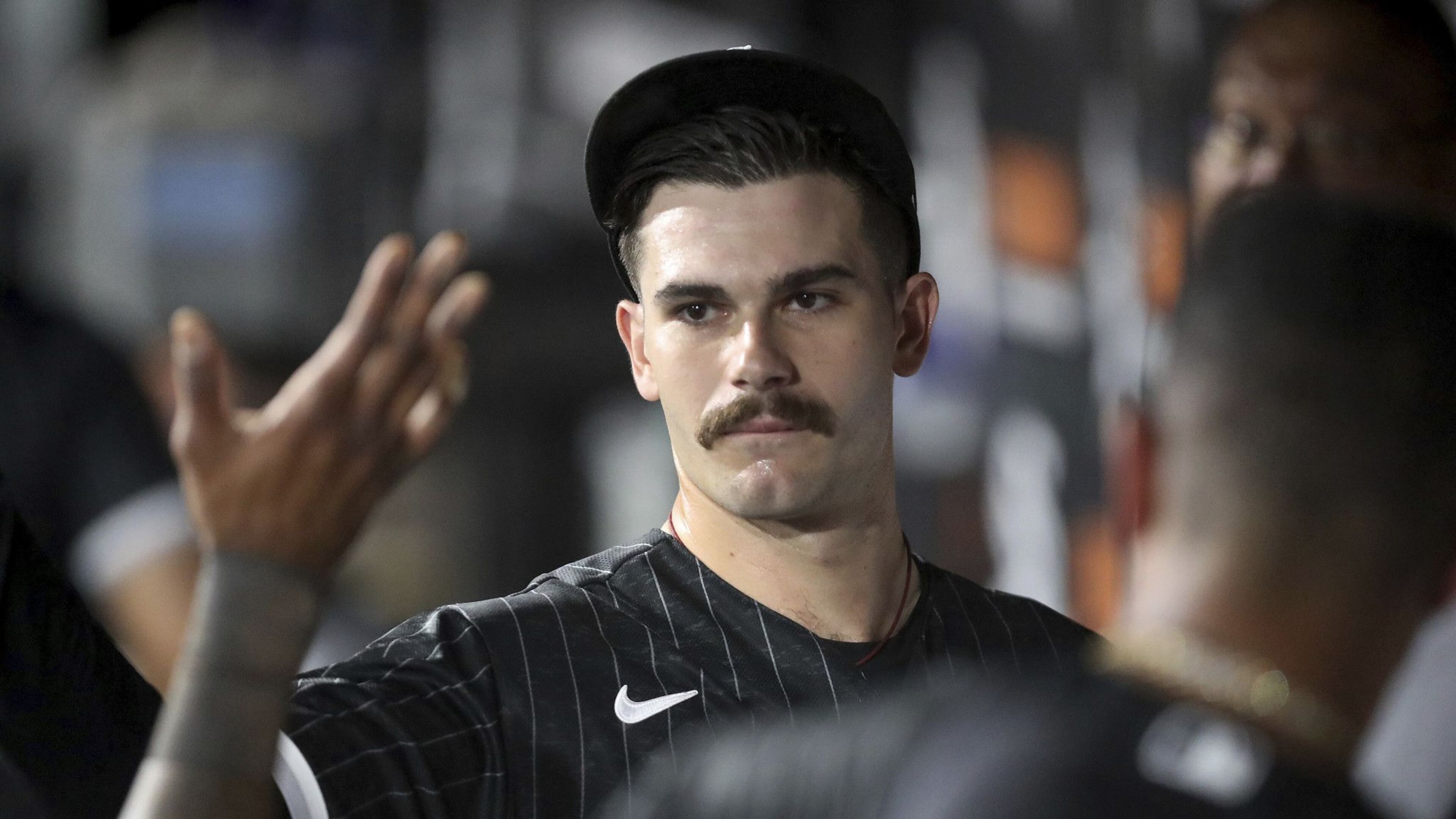 White Sox starting pitcher Dylan Cease receives a high-five in the dugout after finishing off the Toronto Blue Jays in the sixth inning on June 21, 2022, at Guaranteed Rate Field. (Chris Sweda/Chicago Tribune/TNS)