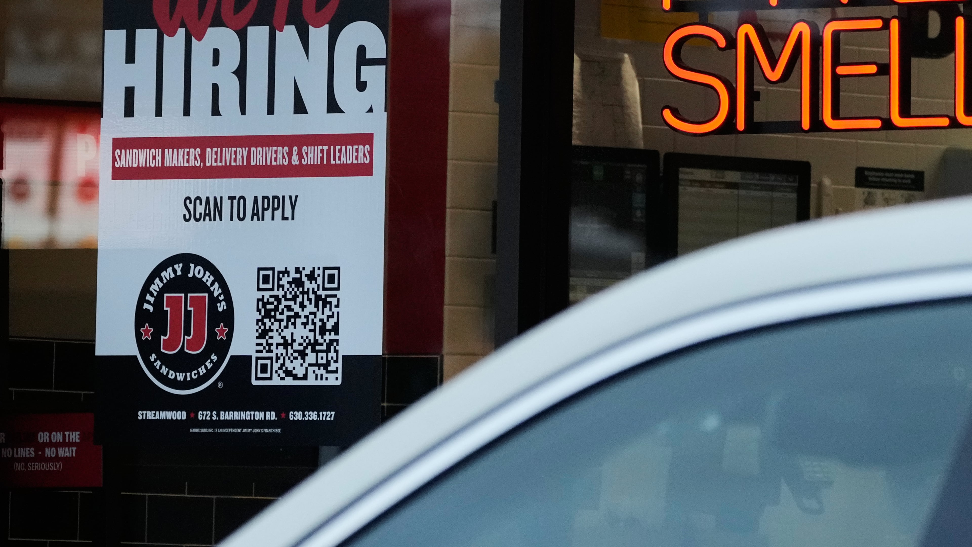 A hiring sign is displayed at a sandwich shop, in Streamwood, Ill., Wednesday, Sept. 16, 2026. (AP Photo/Nam Y. Huh)