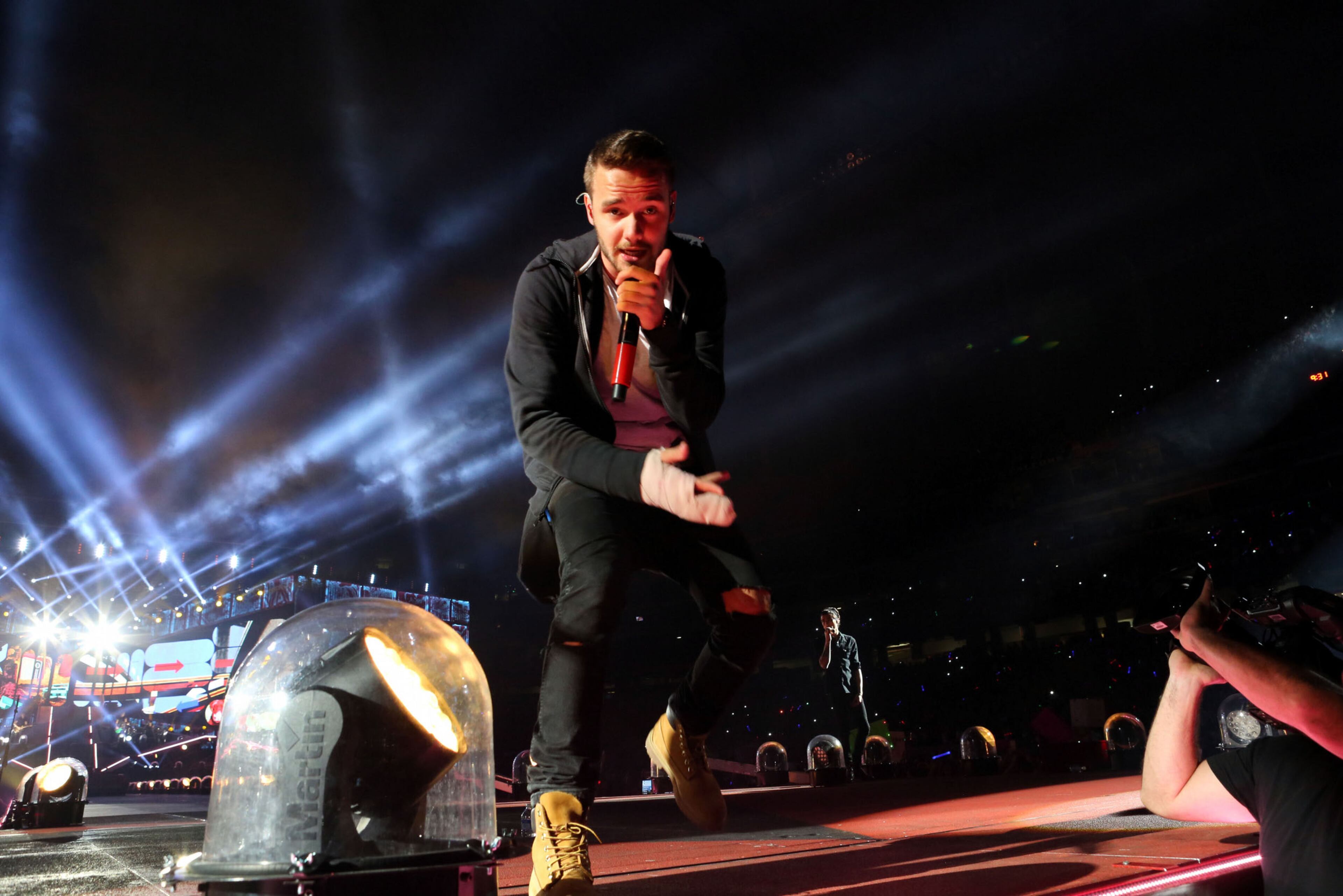 Liam Payne plays with English-Irish pop boy band One Direction during their sold-out "Where We Are" tour Wednesday, October 1, 2014 at the Georgia Dome in Atlanta. Robb D. Cohen/RobbsPhotos.com