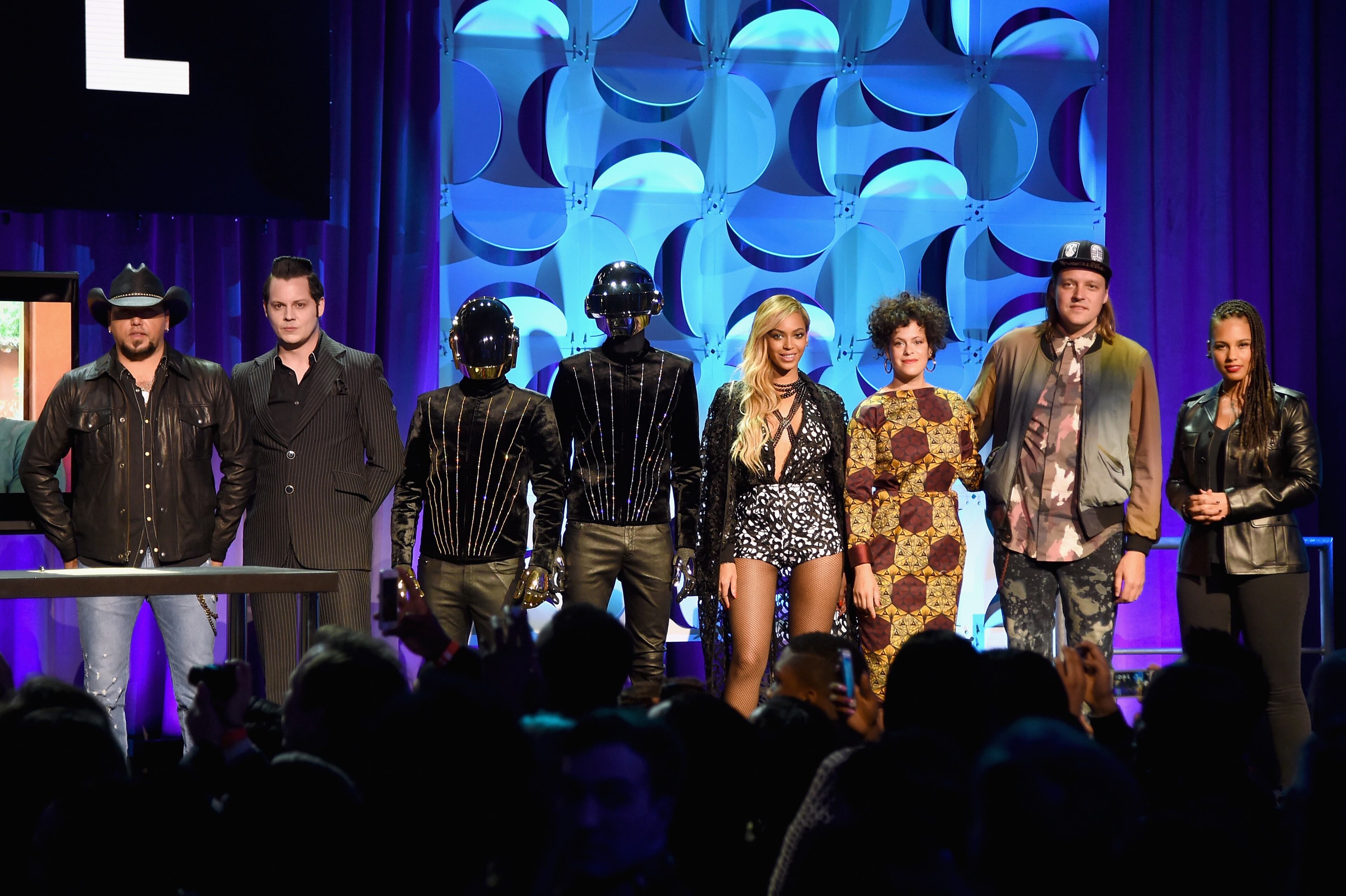 NEW YORK, NY - MARCH 30: (L-R) Jason Aldean, Jack White, Daft Punk, Beyonce, Regine Chassagne, Win Butler, and Alicia Keys onstage at the Tidal launch event #TIDALforALL at Skylight at Moynihan Station on March 30, 2015 in New York City. (Photo by Jamie McCarthy/Getty Images for Roc Nation)
