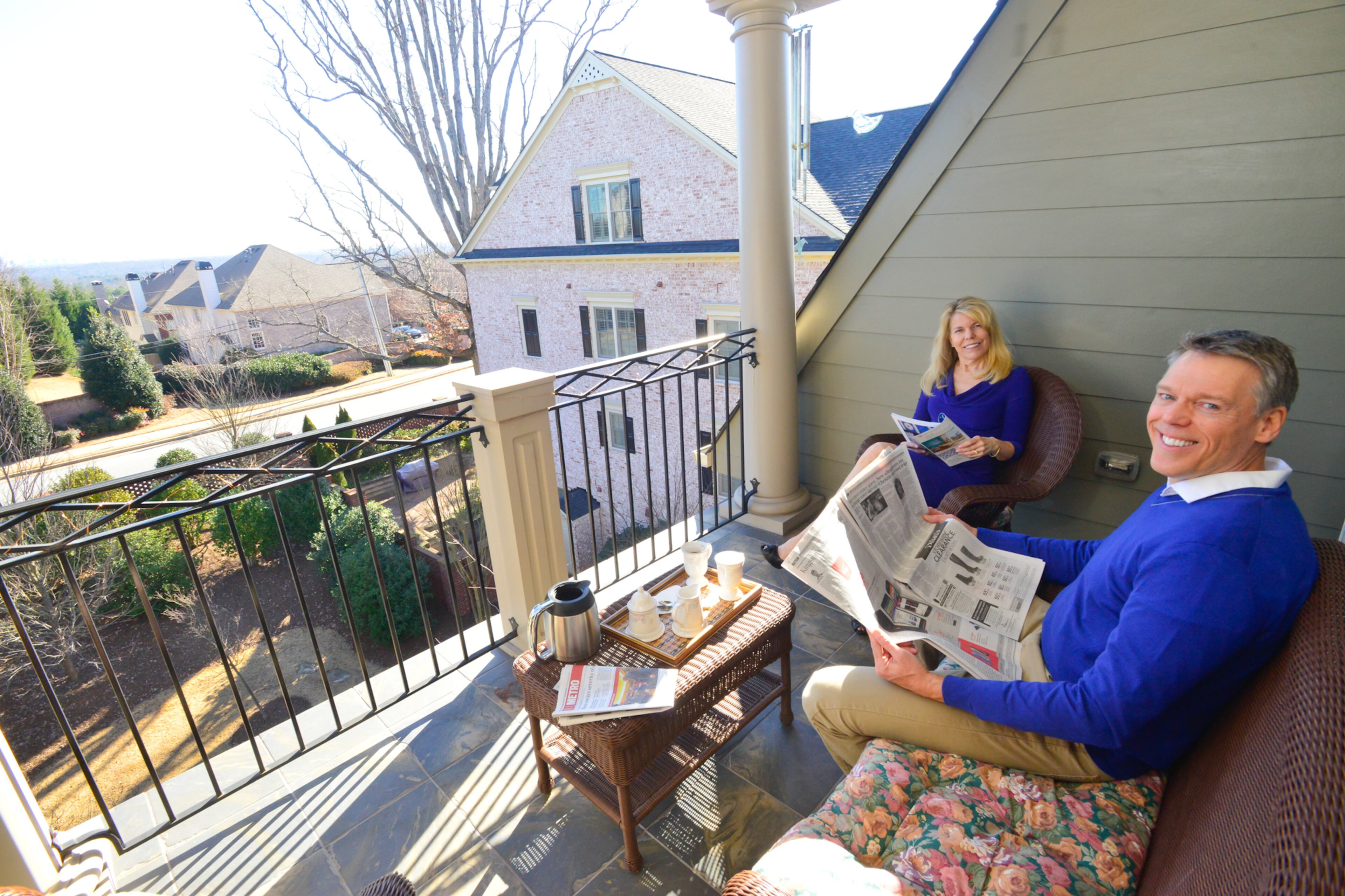 Christopher and Vicki Netzband enjoy spending time in the morning or evening on their Smyrna townhome's fourth-floor terrace, which gives them views of Stone Mountain and Buckhead. They said they were able to see a fireworks display on New Year's Eve.
