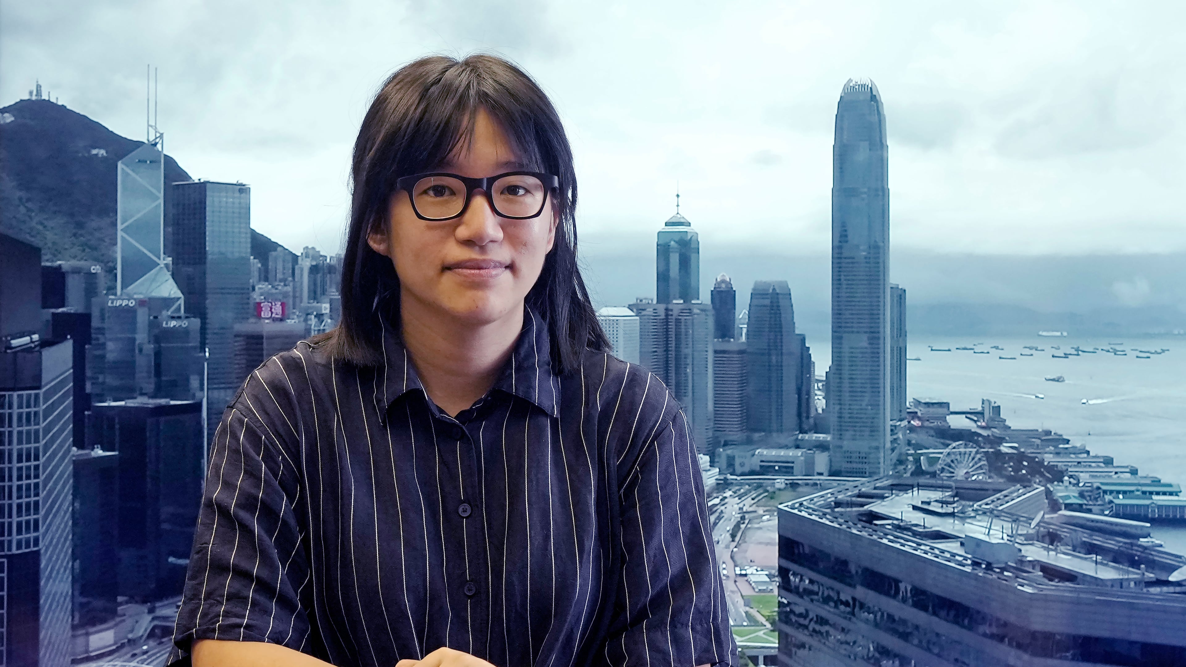 FILE - Chow Hang-tung, vice chairperson of the Hong Kong Alliance in Support of the Democratic Patriotic Movements of China, poses after an interview in Hong Kong on May 24, 2021. (AP Photo/Vincent Yu, File)
