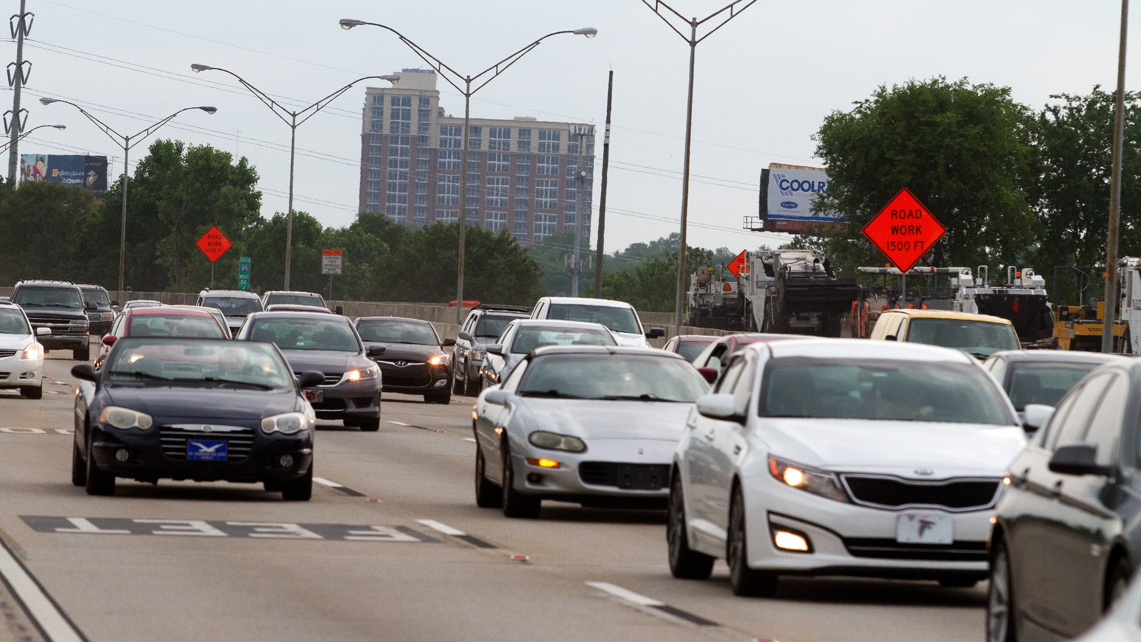Cars drive over the recently opened northbound lanes of I-85 in Atlanta on Friday evening, May 12, 2017. STEVE SCHAEFER / SPECIAL TO THE AJC