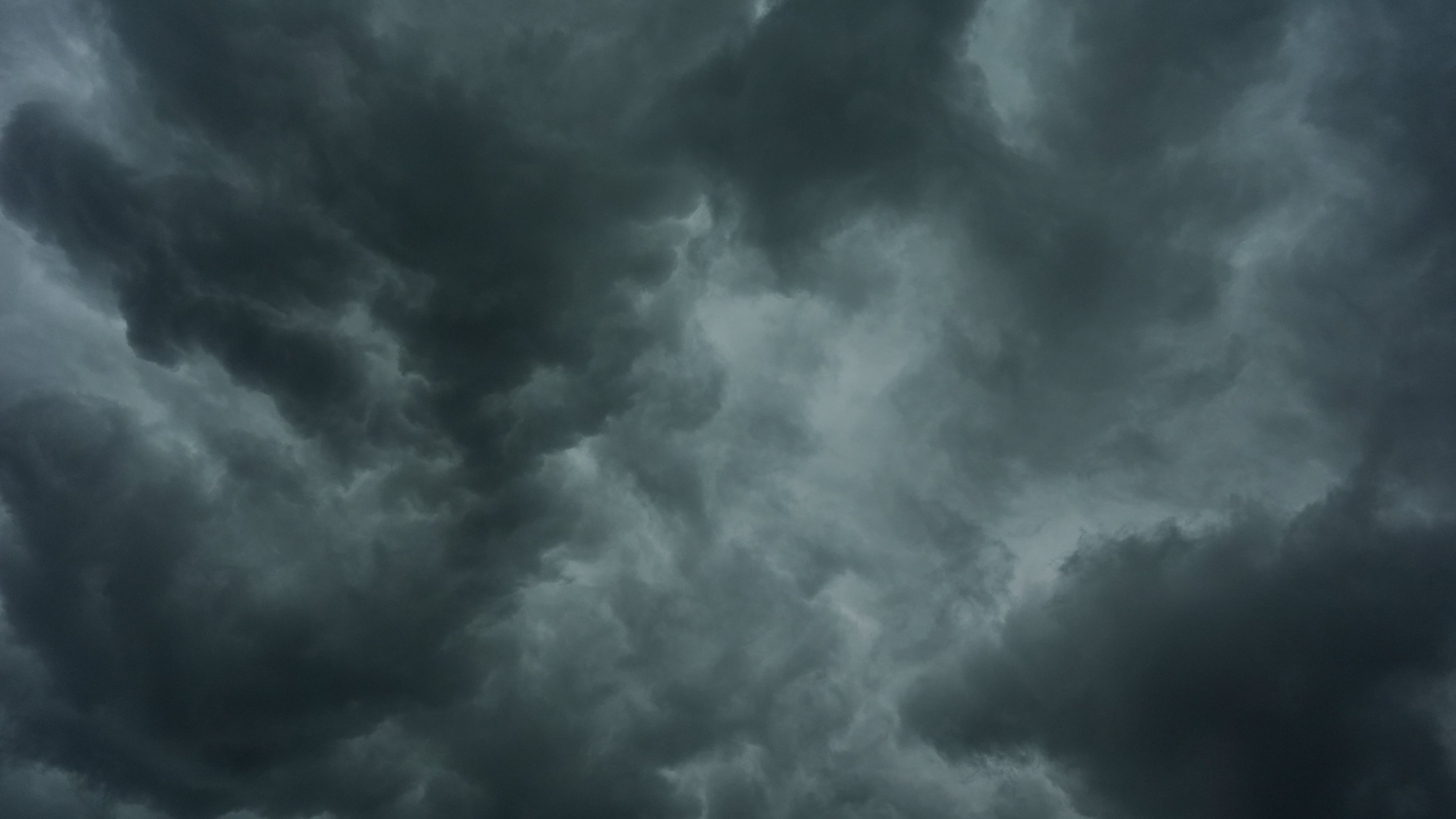 Storm clouds are seen over the Cincinnati Bengals NFL football practice in Cincinnati, Tuesday, Aug. 11, 2026. (AP Photo/Carolyn Kaster)