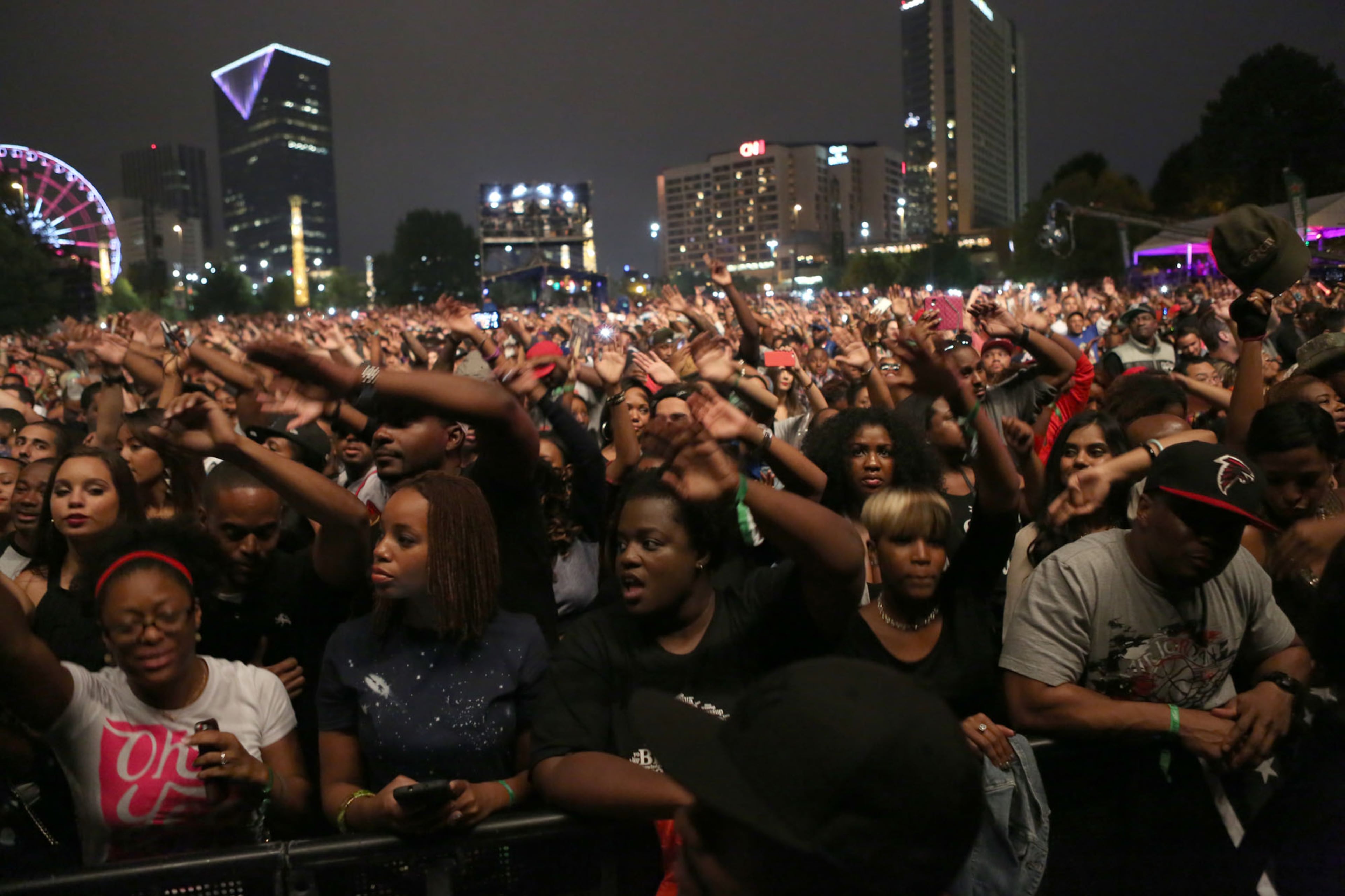 An enthusiastic sold-out crowd fills the grounds of Centennial Olympic Park in Atlanta on Sunday, Sept. 28, 2014, celebrating the 20th anniversary of the legendary hip-hop group Outkast. (Akili-Casundria Ramsess/Eye of Ramsess Media)