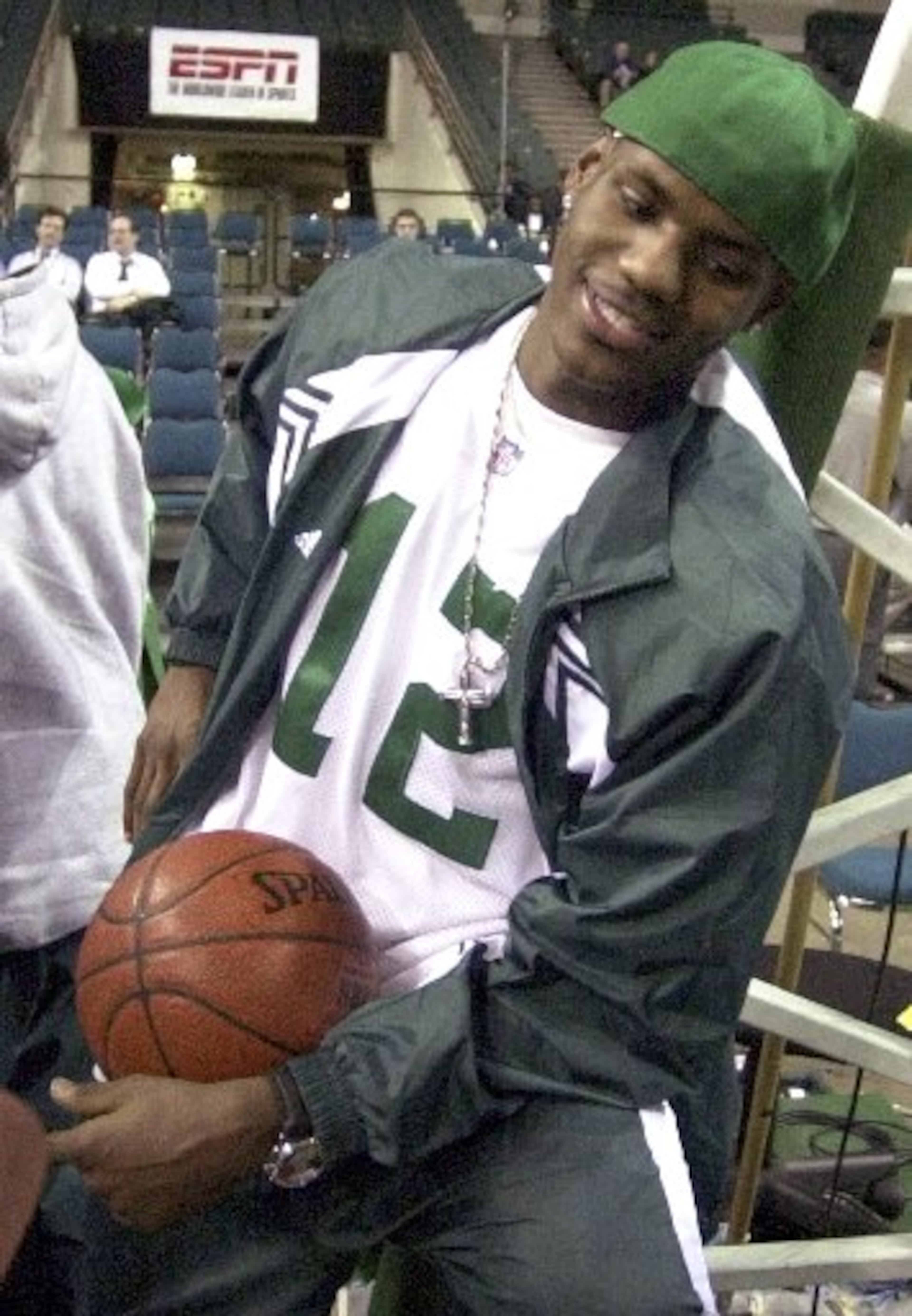 High school basketball star LeBron James wears a Joe Namath jersey Dec. 12, 2002 at the Cleveland State Convocation Center in Cleveland. The Ohio High School Athletic Association ruled Friday, Jan. 31, 2003, that James is ineligible to play the rest of the season because he accepted free clothes. Ohio high school officials reviewed a report that James received two free ``throwback'' jerseys worth $845 at a clothing store in Cleveland. . The team will also forfeit Sunday's game. (AP Photo/Mark Duncan)