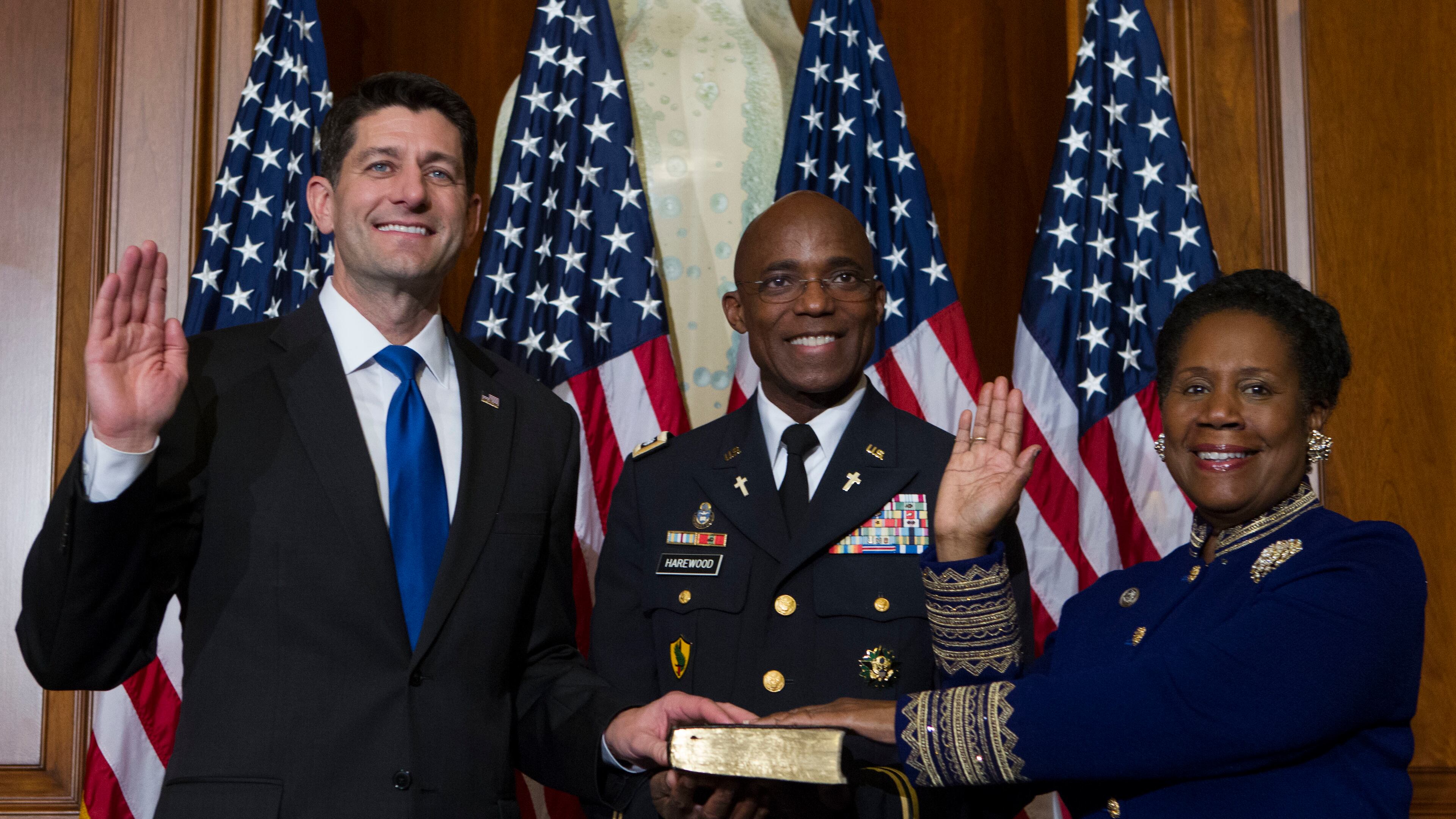 House Speaker Paul Ryan of Wis. administers the House oath of office to Rep. Shelia Jackson Lee, D-Texas, during a mock swearing in ceremony on Capitol Hill in Washington, Tuesday, Jan. 3, 2017, as the 115th Congress began. ( AP Photo/Jose Luis Magana)