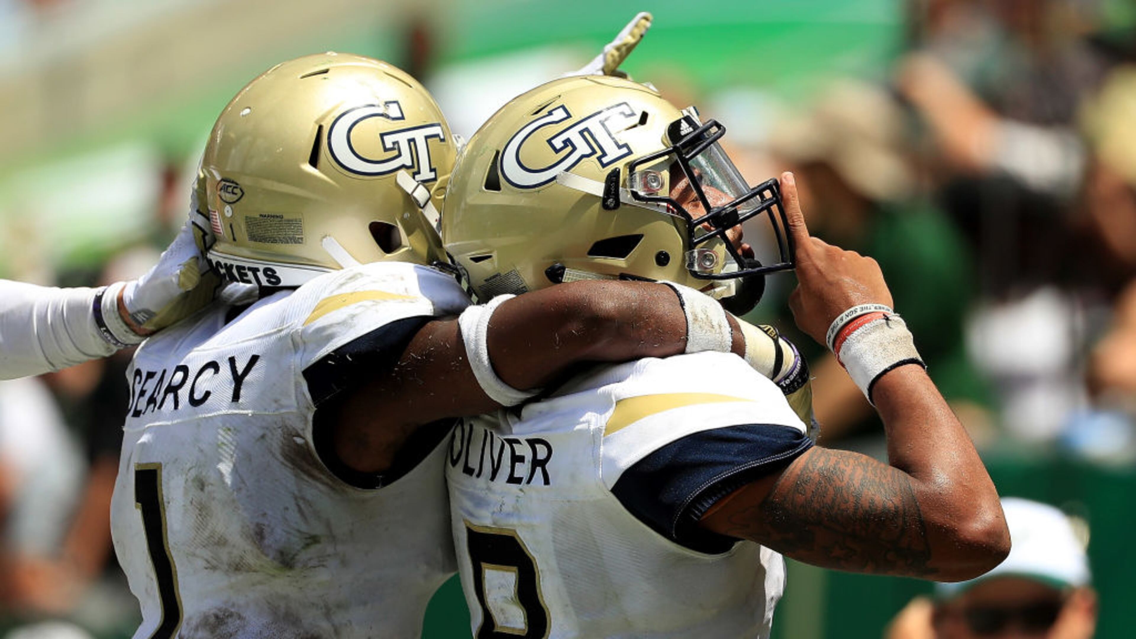 TAMPA, FL - SEPTEMBER 08: Tobias Oliver #8 of the Georgia Tech Yellow Jackets celebrates a touchdown during a game against the South Florida Bulls at Raymond James Stadium on September 8, 2018 in Tampa, Florida. (Photo by Mike Ehrmann/Getty Images)