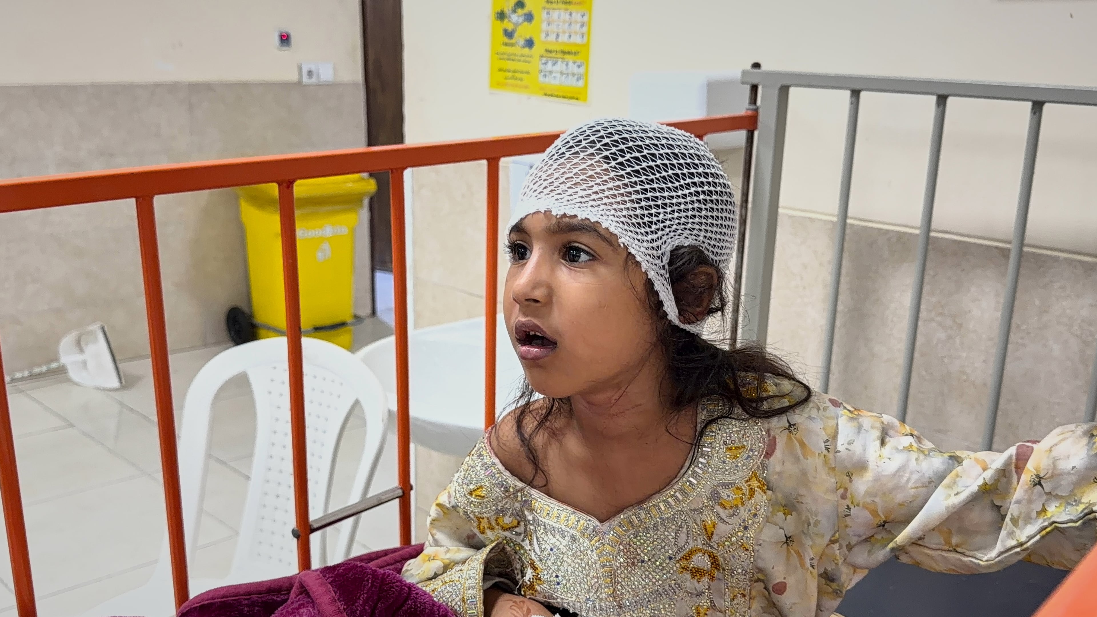 A child wounded, according to Tasnim news agency, in a strike on a home where a wedding was being held in Kuhestak, southern Iran, receives treatment at a hospital in Menab, Iran, early Wednesday, Sept.2, 2026. (Morteza Akhoondi/Tasnim News Agency via AP)