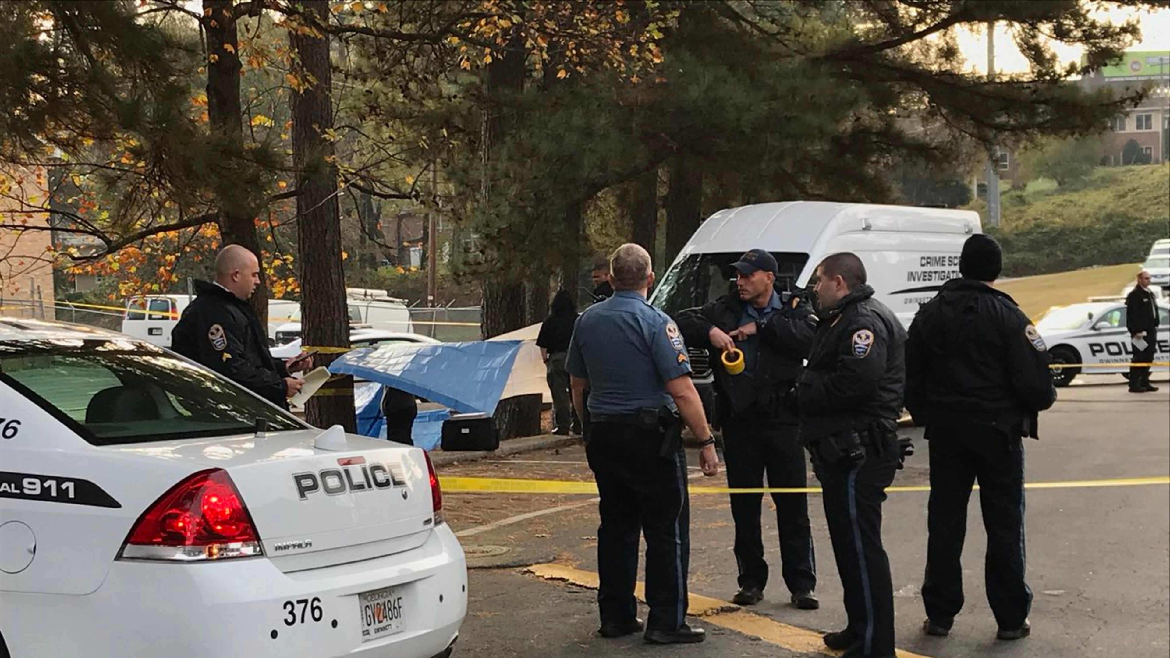 Police are investigating after a man was found shot dead at an apartment complex in Gwinnett County.