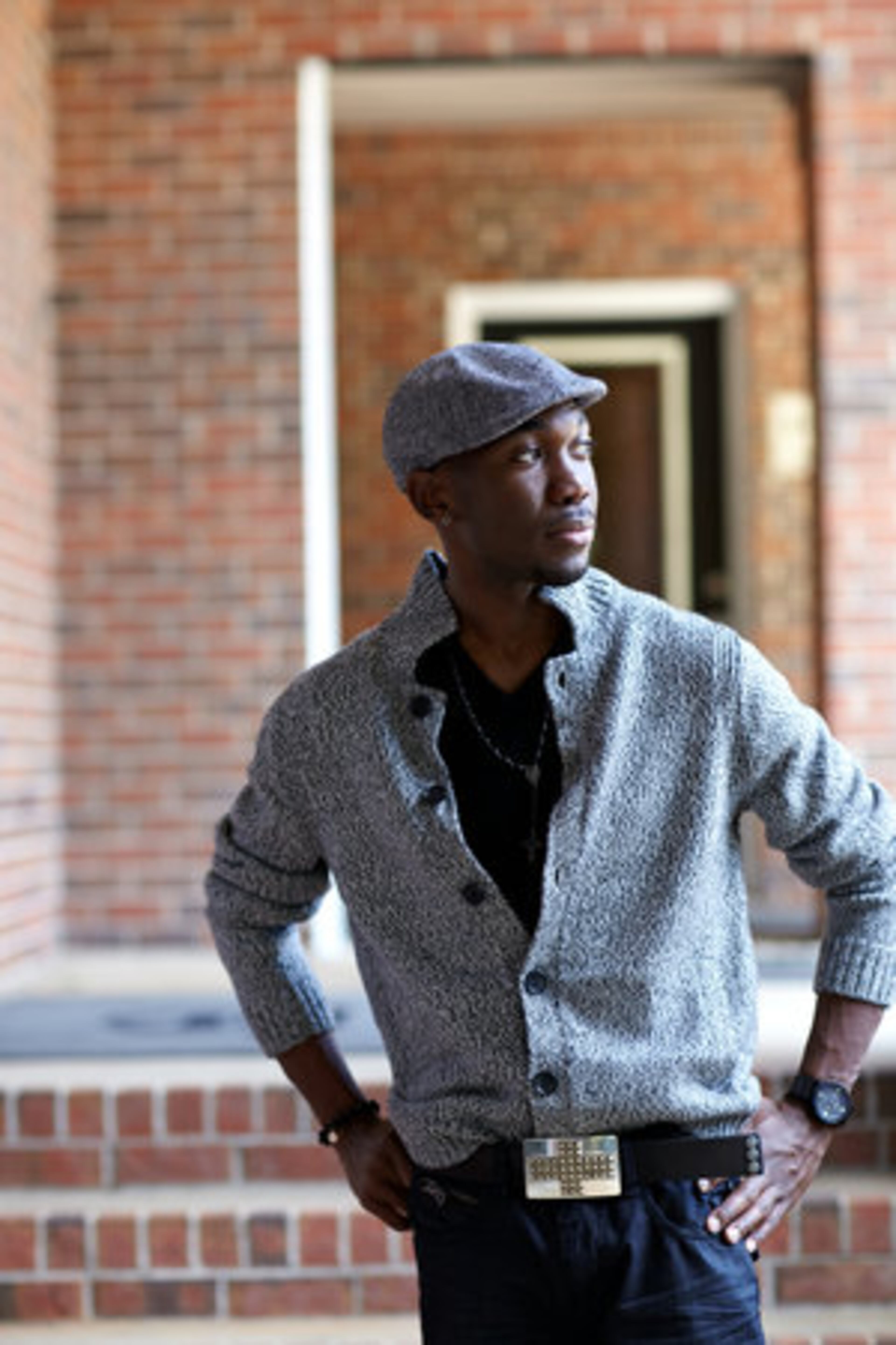 FAVORITE LABELS: "Gucci, Prada, Louis Vuitton, Dolce & Gabbana, Ralph Lauren and David Yurman." Harper shows off his Banana Republic cardigan that he pairs with a cashmere v-neck top from Kenneth Cole. He accessorizes with a Fossil watch, a black stone bracelet from Beadology and a pageboy cap from Apt. 9.