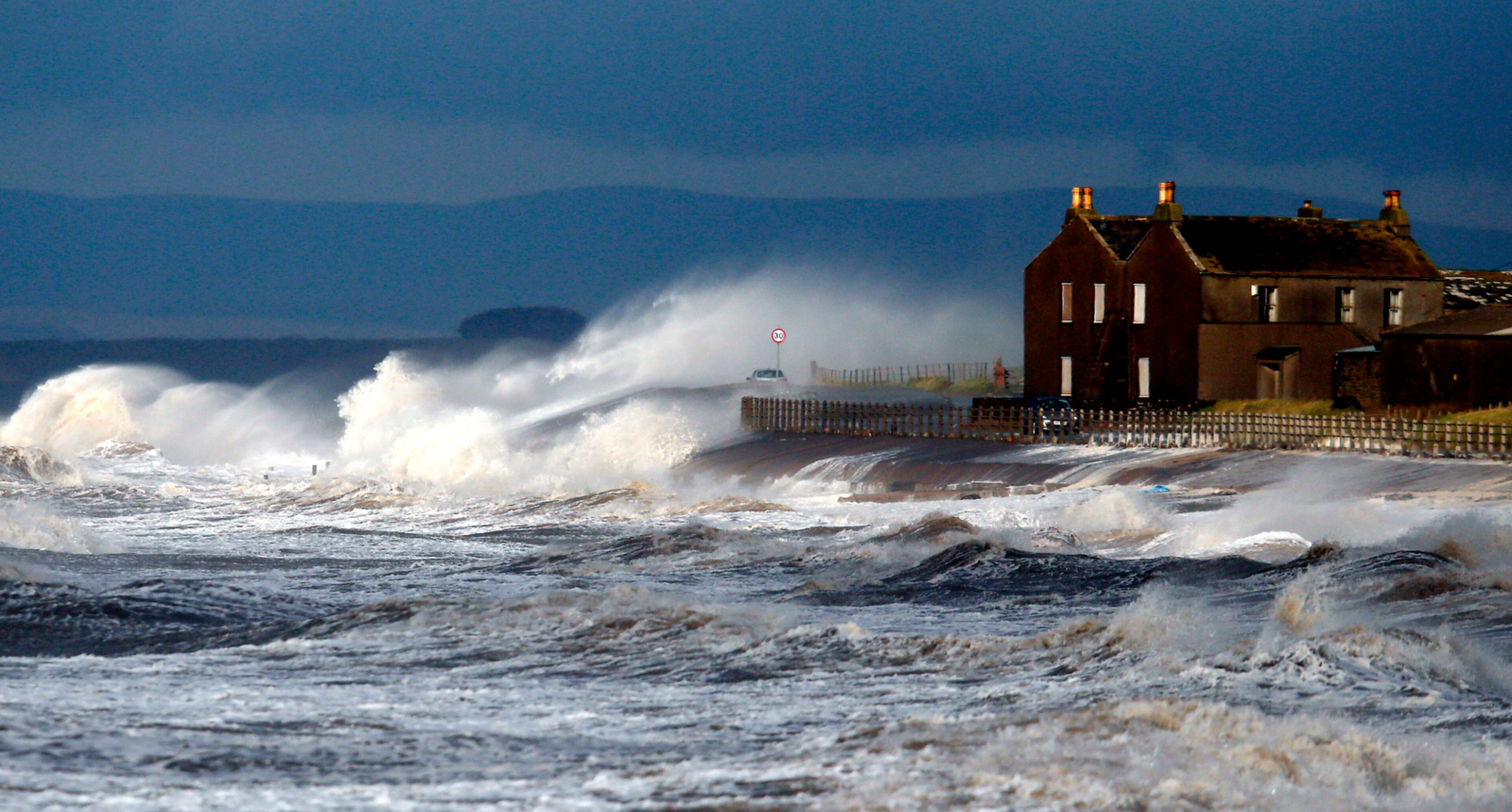 A BLOW HITS THE COAST--Gale force winds blow across the sea at Allonby northwest England as the tail end of Storm Abigail hits the coast Friday Nov. 13, 2015. All schools in Shetland and the Western Isles in Scotalnd will be closed to pupils Friday as Storm Abigail sweeps across the Britain, with gusts of up to 90-miles-per-hour forecast. (Owen Humphreys/PA via AP)