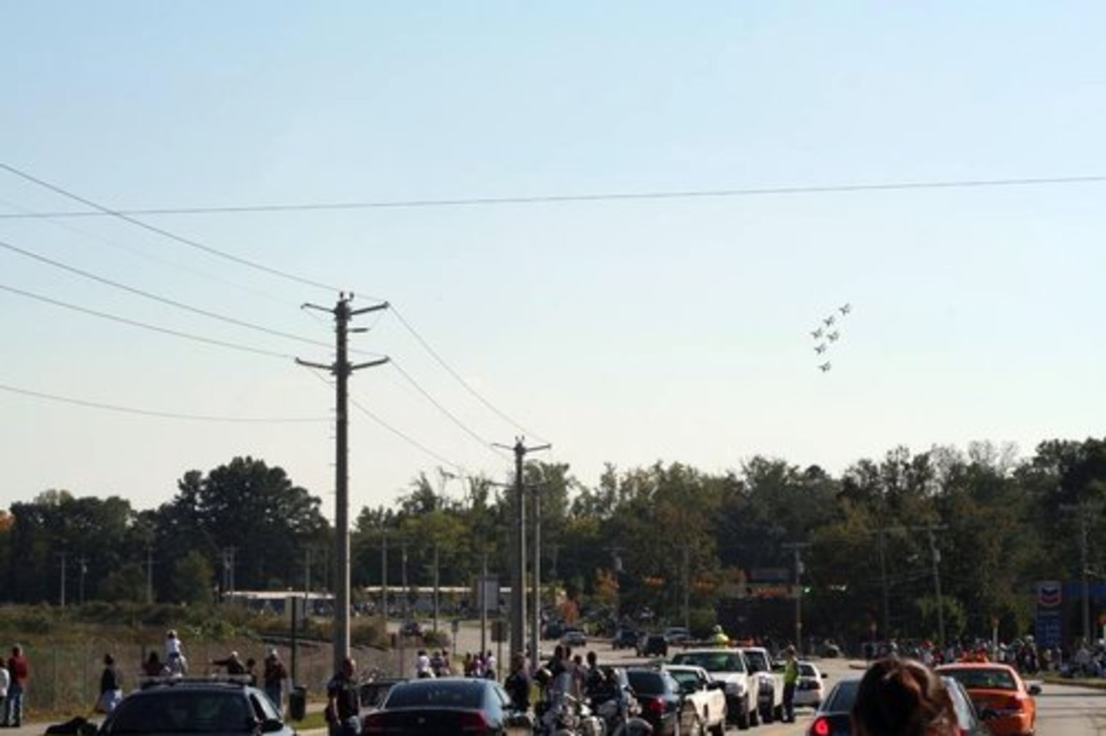 Spectators and security down Atlanta Road enjoying the Thunderbirds.
