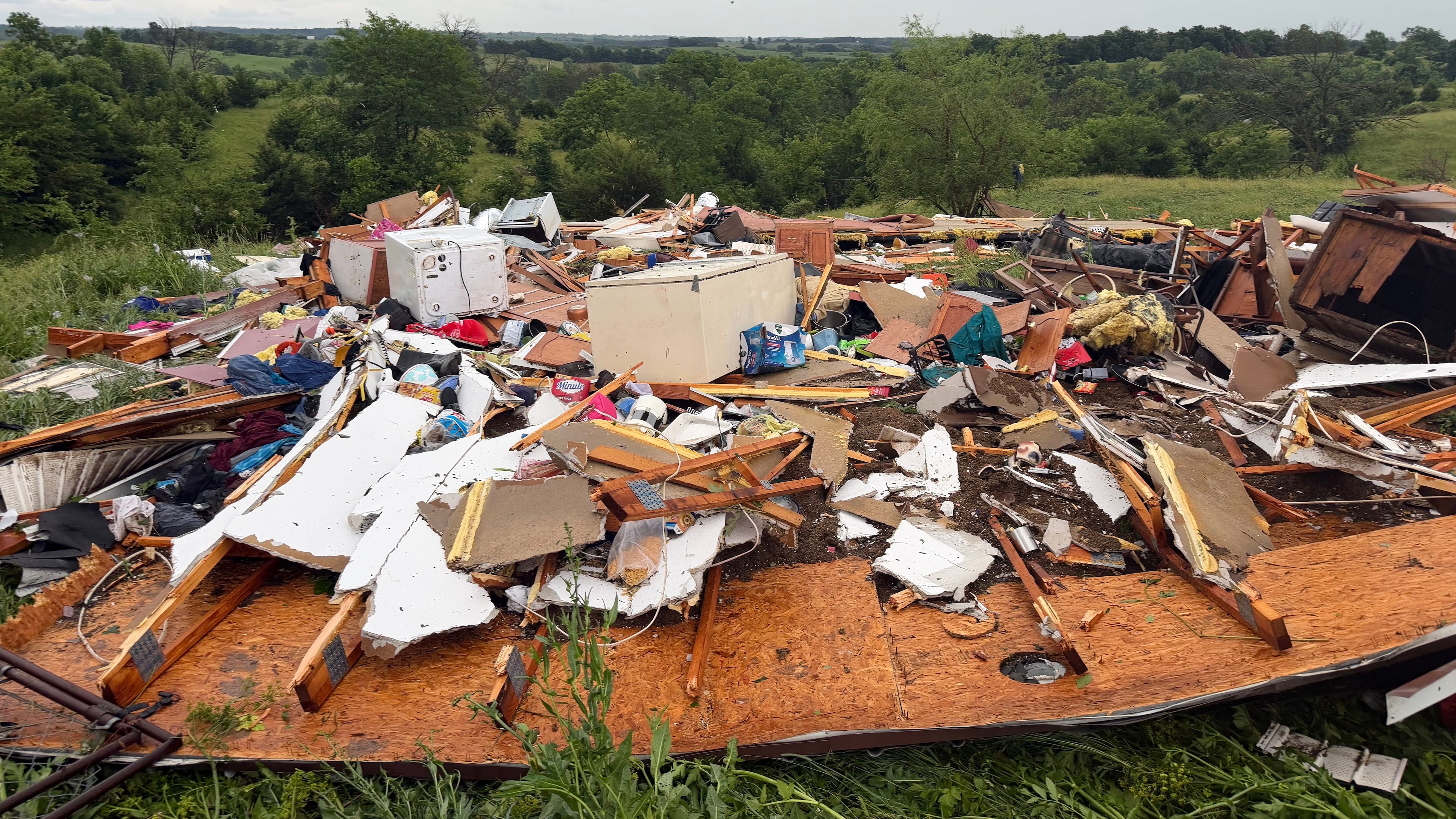 This photo provided by Kylie Rouse shows the remnants of Shane and Jimmie Tipton's home in Unionville, Mo., Wednesday, June 10, 2026, after a tornado struck. (Kylie Rouse via AP)