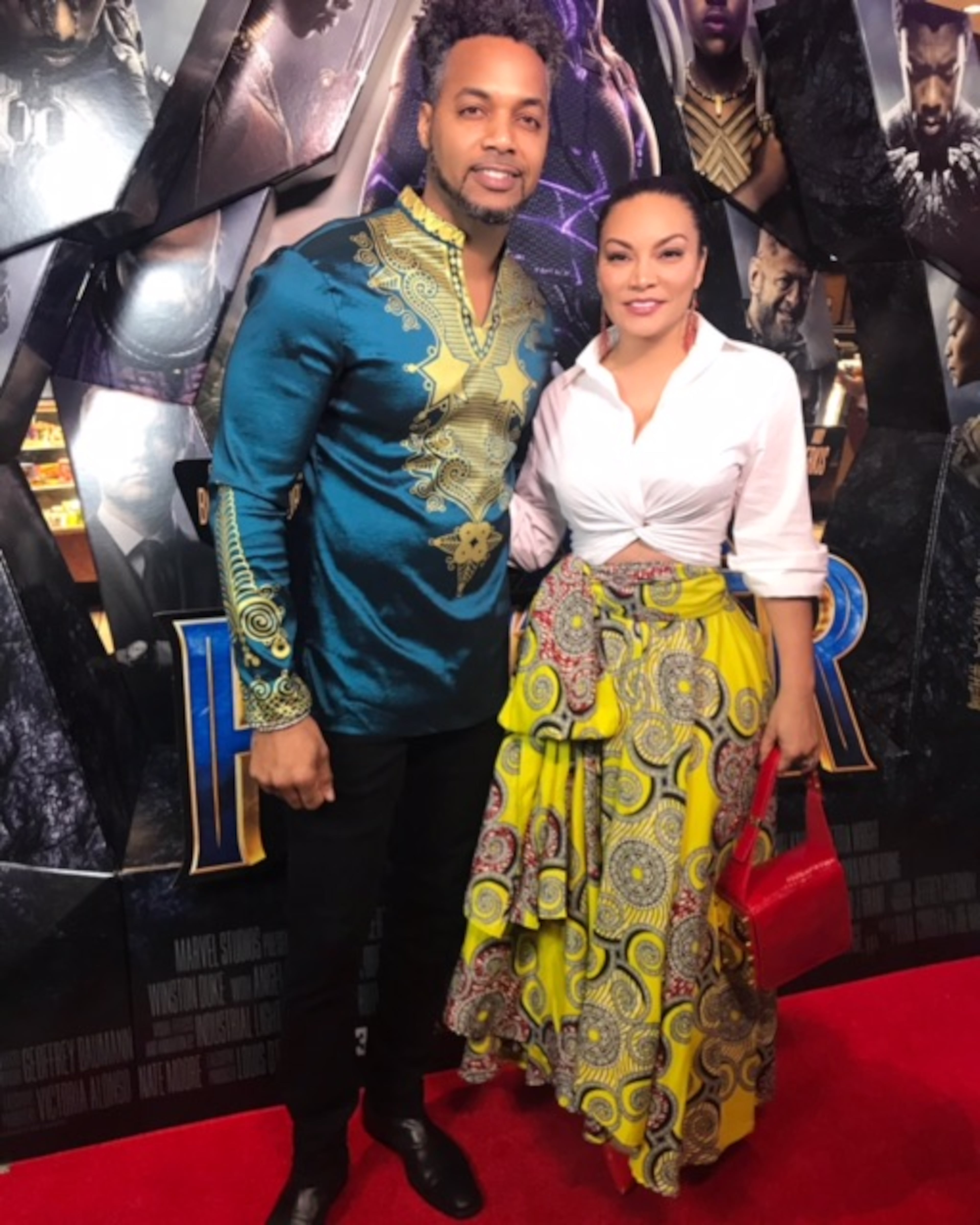 TV personality/real estate expert Egypt Sherrod and producer/artist, DJ Fadelf on the red carpet at the "Black Panther" screening hosted by T.I. and Walmart. Photo by Aric Thompson.