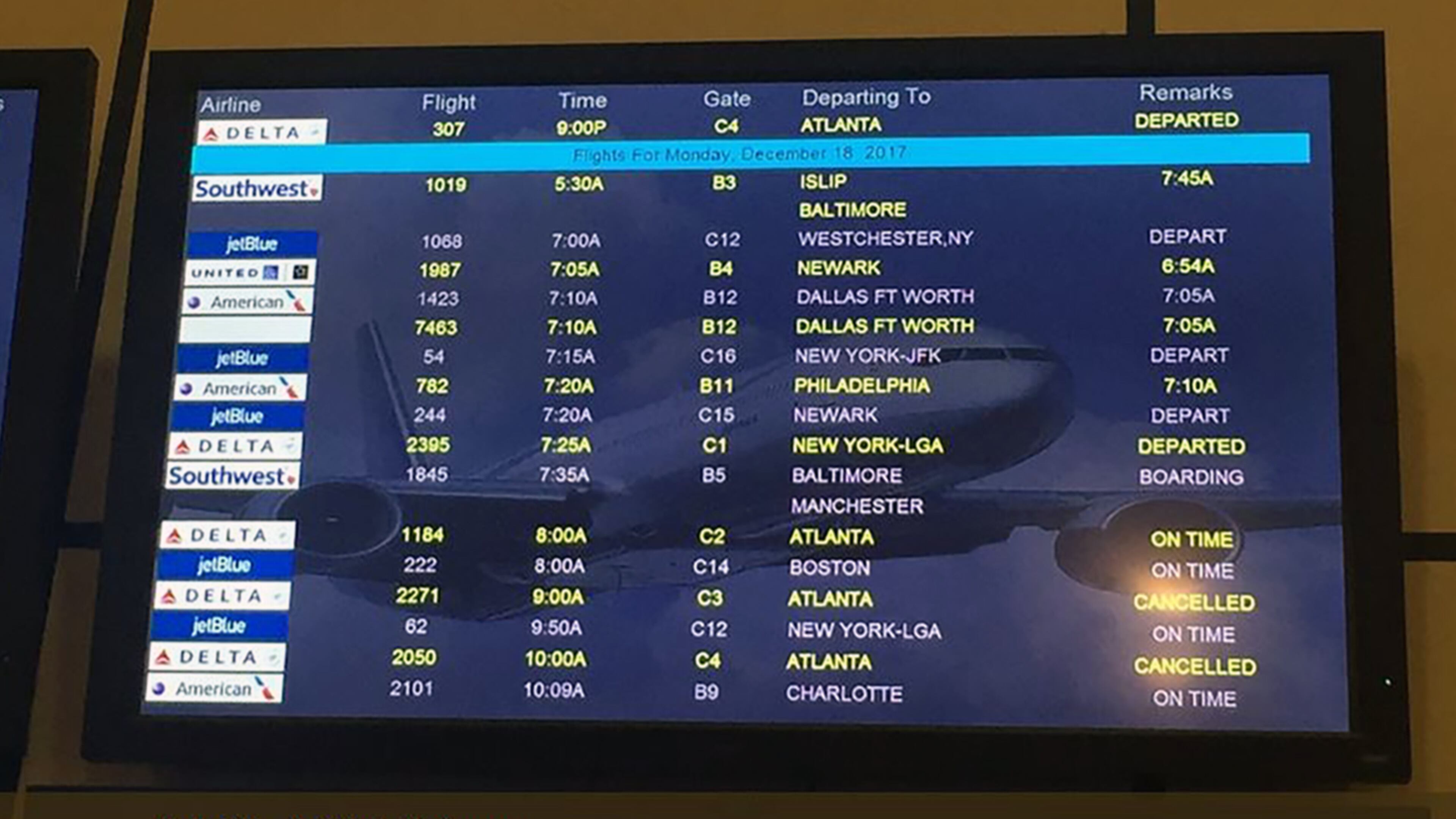 People flying between Atlanta and South Florida met with some delays Monday morning following a power outage Sunday that brought Atlanta’s airport to a halt. (Rachel Frazin/The Palm Beach Post)
