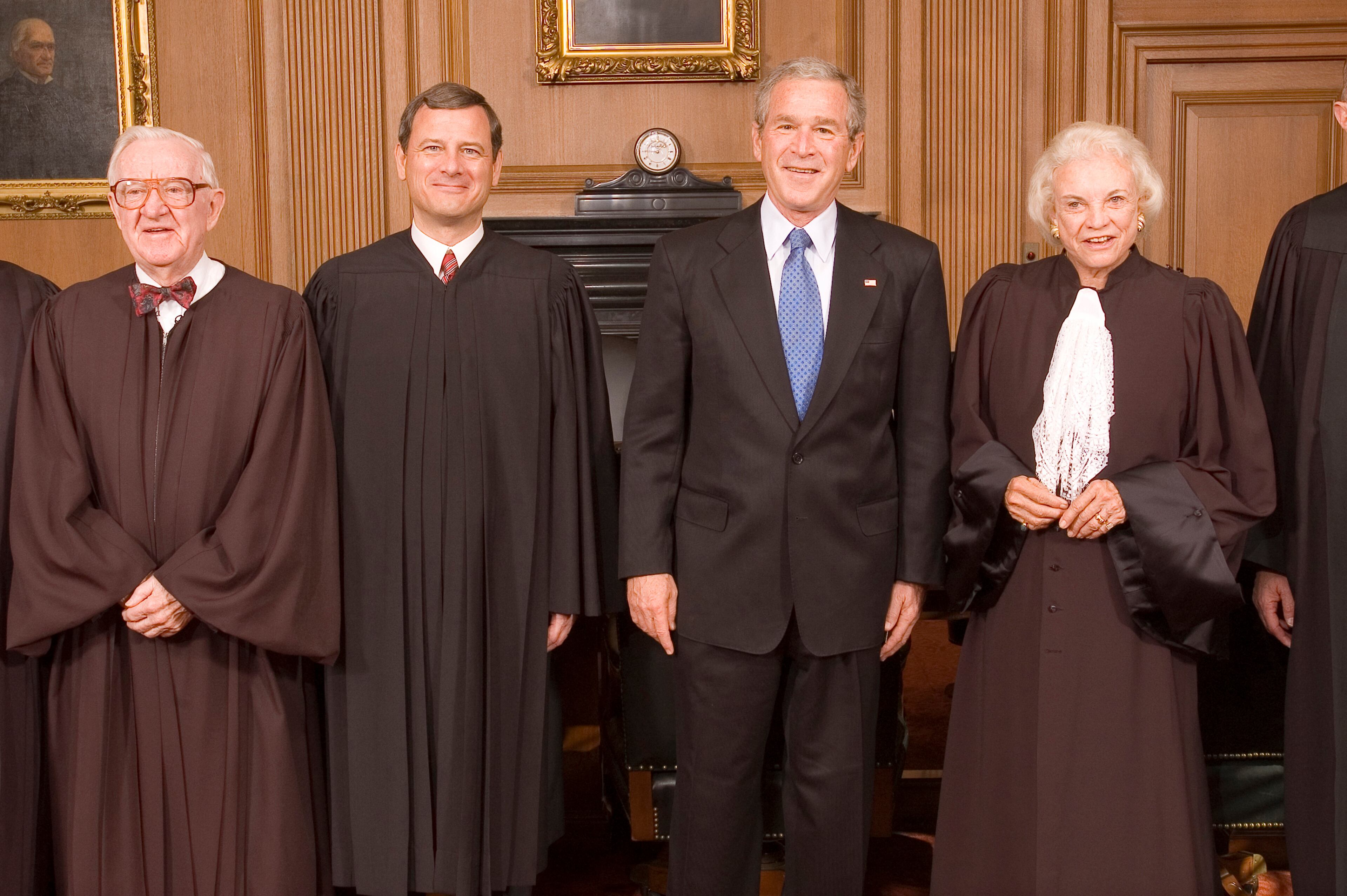 WASHINGTON, DC - OCTOBER 3: (L-R) John Paul Stevens, Chief Justice John Roberts, U.S. President George W. Bush and senior Justices Sandra Day O'Connor in the Chief Justice's Conference Room October 3, 2005 at the Supreme Court in Washington, DC. Replacing William H. Rehnquist, who died last month at age 80, Roberts will take his seat at the helm of the high court on the opening day of the 2005-06 term as the first new justice in more than 10 years and its first new chief in almost 20.