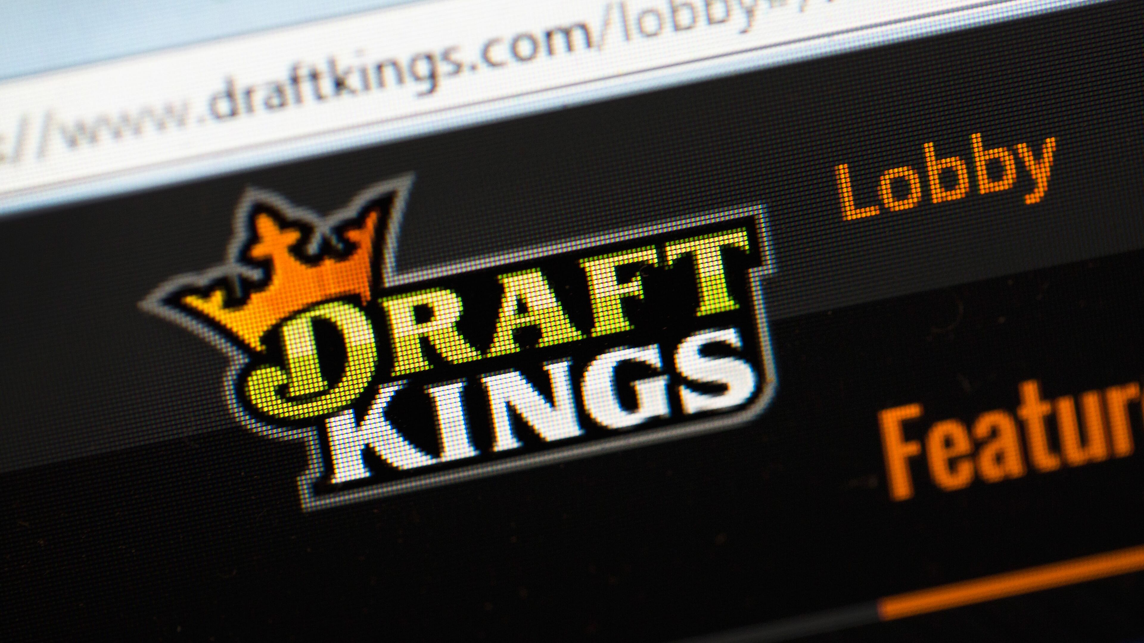 The fantasy sports website DraftKings is shown last year in Chicago, Illinois. DraftKings and its rival FanDuel came under scrutiny after accusations surfaced of employees participating in the contests with insider information. (Photo illustration by Scott Olson/Getty Images)