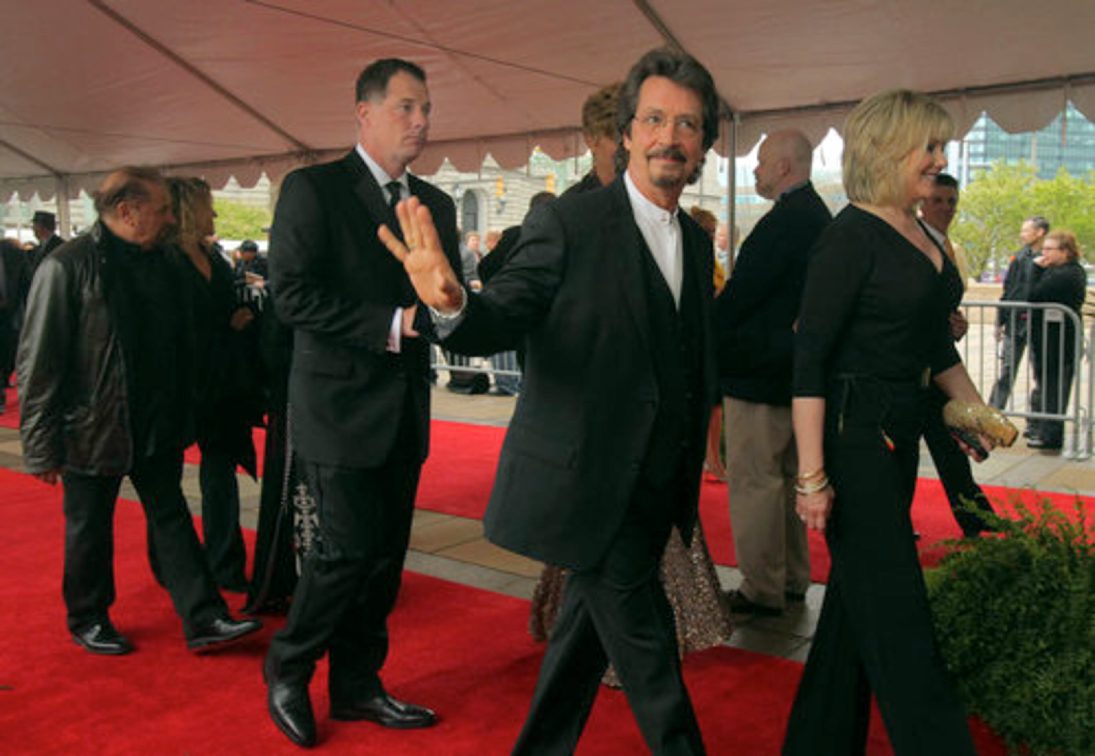 Cleveland rocker Michael Stanley, right, walks the red carpet ahead of Cleveland Browns head coach Pat Shurmur before the start of the 2012 Rock and Roll Hall of Fame Induction ceremony at Public Hall in Cleveland.
