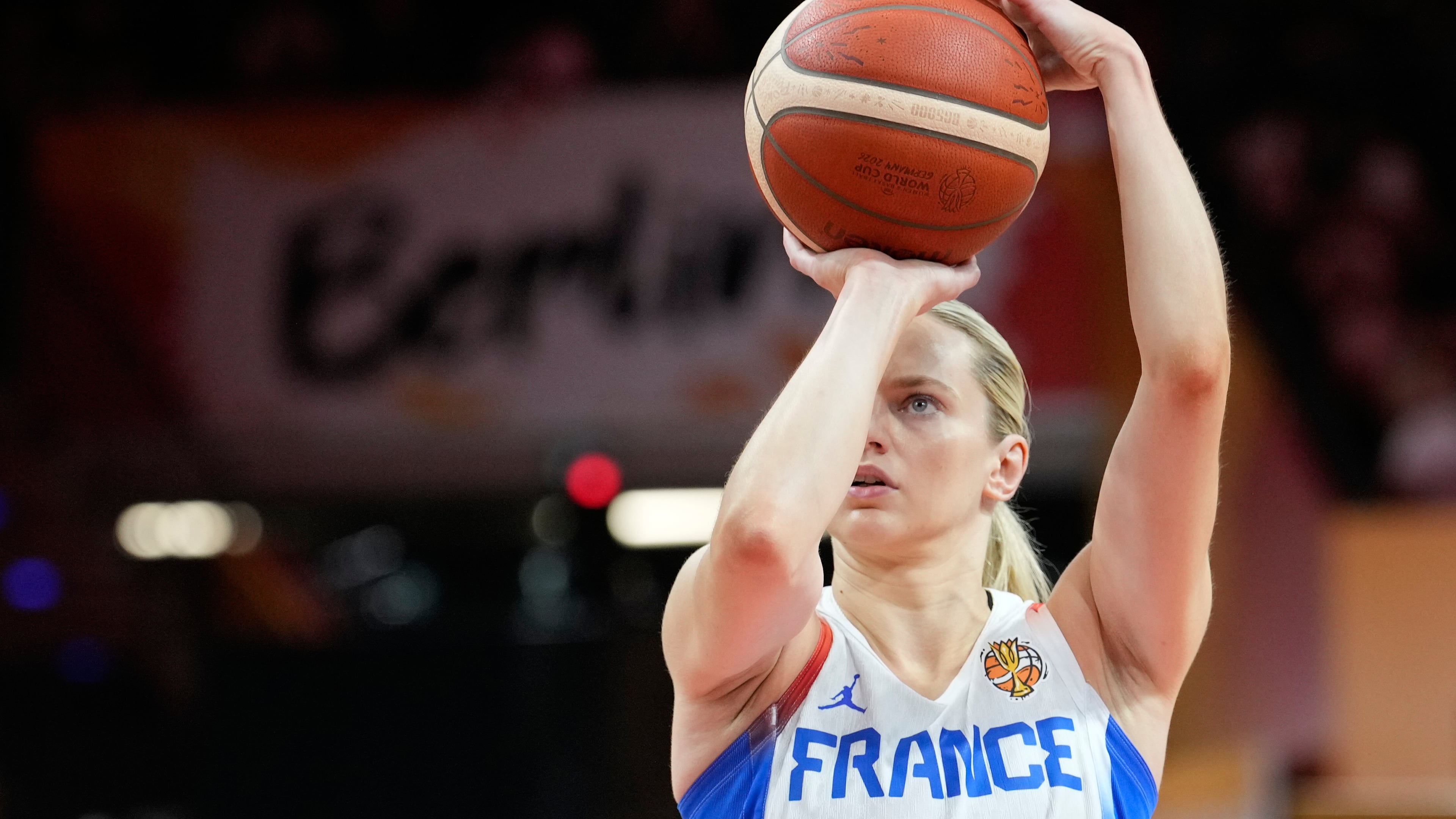 France's Marine Johannes shoots during the Women's Basketball World Cup match between France and Korea in Berlin, Saturday, Sept. 5, 2026. (AP Photo/Ebrahim Noroozi)