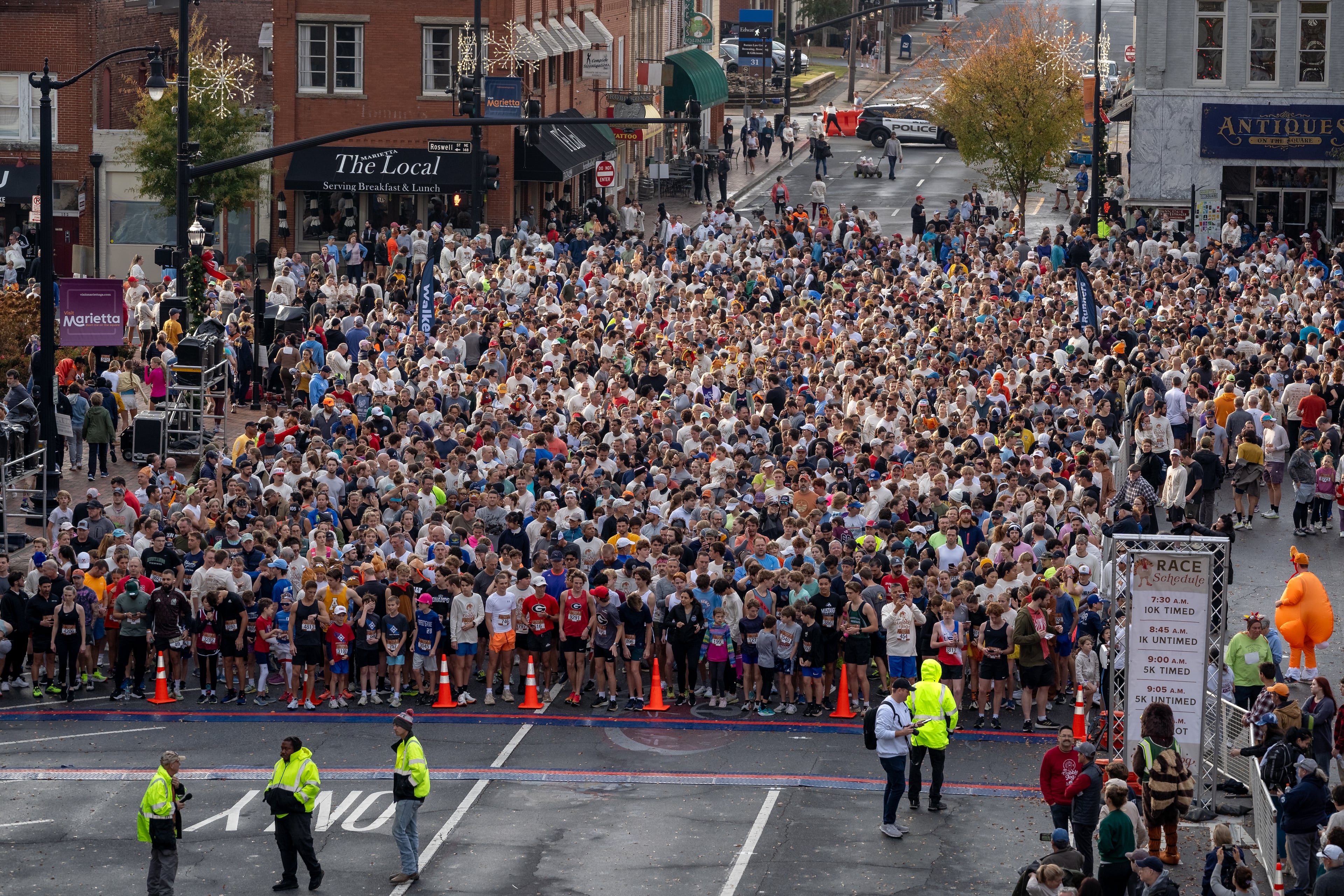 Hundreds gather to run in various races at the 2024 Gobble Jog in downtown Marietta, Georgia. Thursday, November 28, 2024 (Ben Hendren for the Atlanta Journal-Constitution)