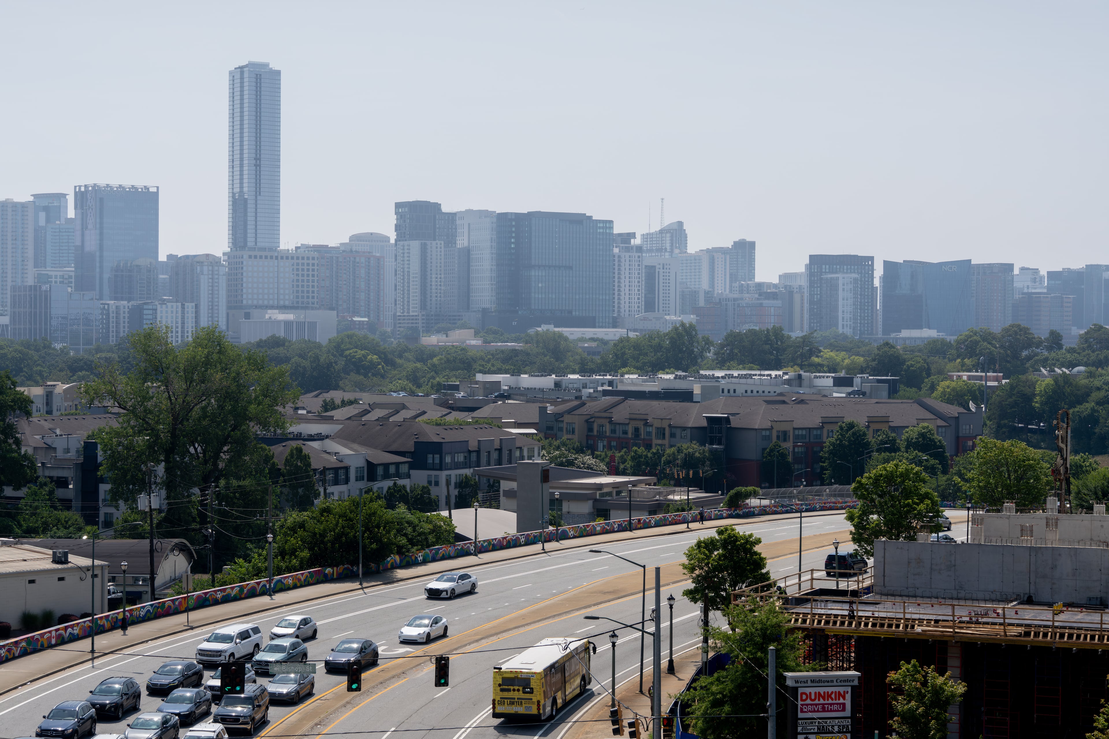 Hazy skies linger above Atlanta on Friday, July 31, 2026. (Ben Hendren for the AJC)