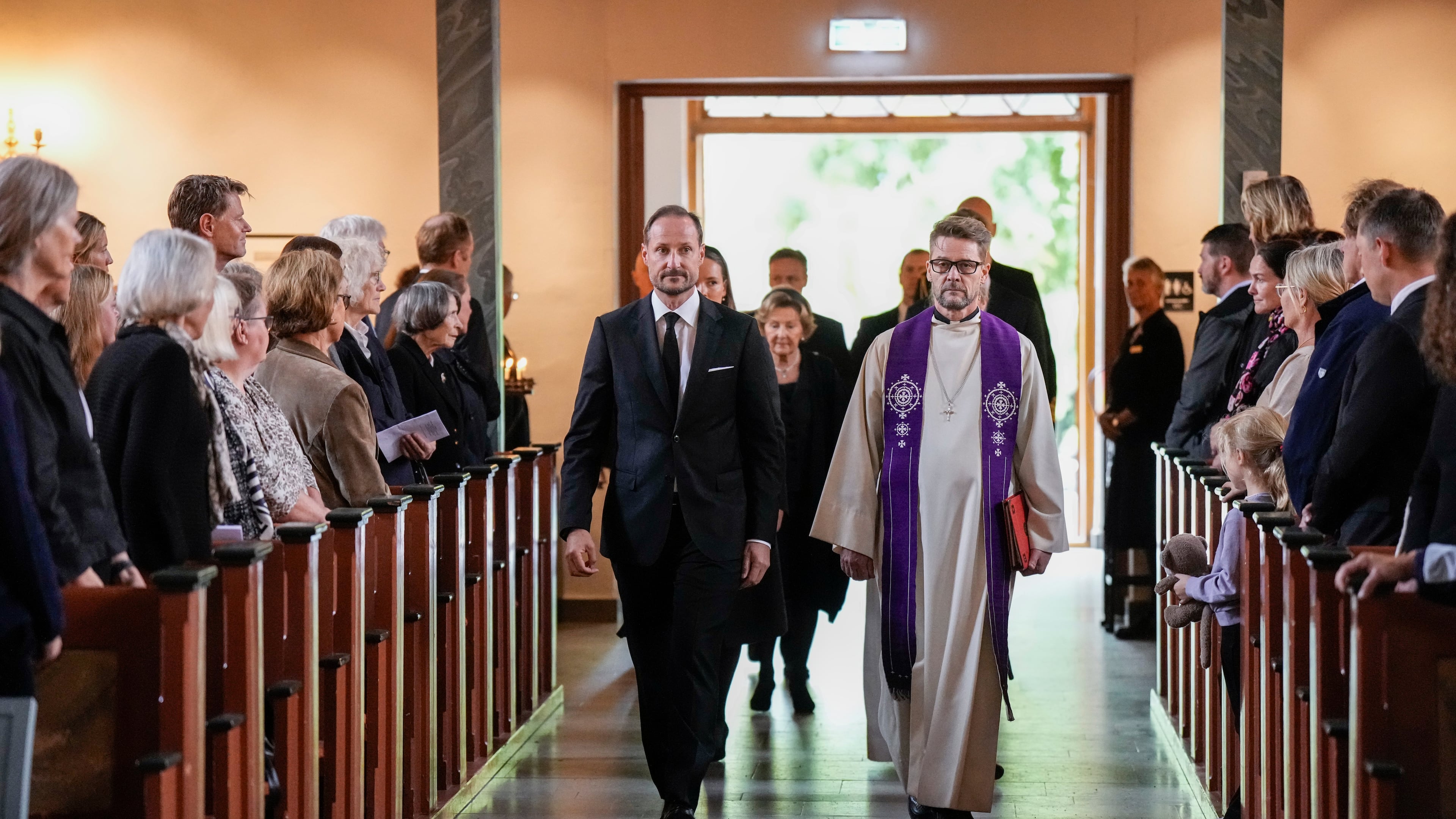 Norway's King Haakon arrives for the mourning service for King Harald in Asker church, Asker, Norway, Sunday Aug. 30, 2026. (Cornelius Poppe/NTB via AP)