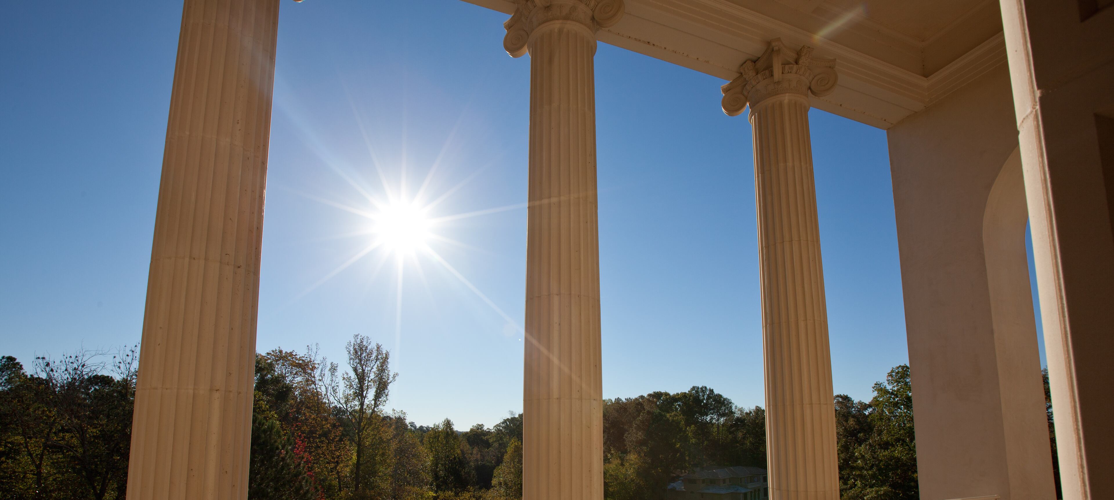 The home was inspired by the Greek Acropolis and features many classical details. Image courtesy of Paul Wegener, Atlanta Fine Homes Sotheby's International Realty