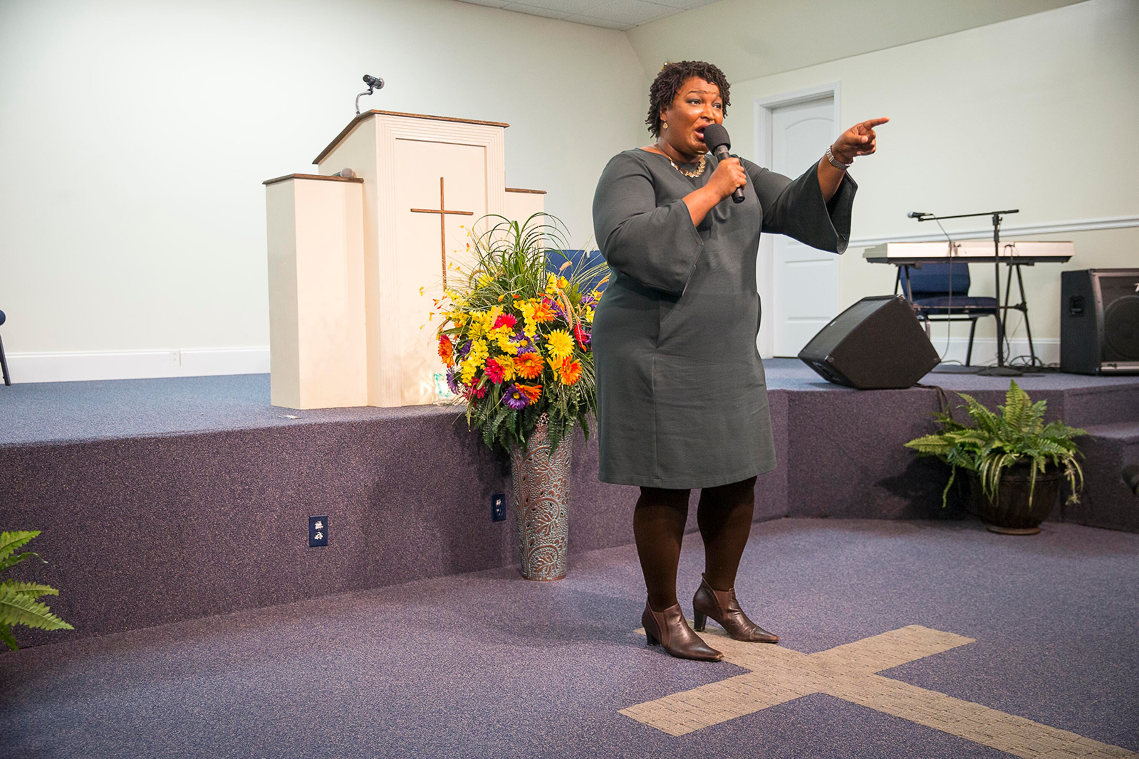 10/29/2018 -- Warrenton, Georgia -- Gubernatorial candidate Stacey Abrams speaks during an early voters rally at Ministers of Faith Christian Center in Warrenton, Monday, October 29, 2018. Stacey Abrams was joined by Georgia Democratic chairman DuBose Porter, Democratic candidate for Lieutenant Governor Sarah Riggs Amico, Democratic Attorney General candidate Charlie Bailey and Democratic Georgia Labor Commissioner Richard Keatley at the Warrenton stop of the "We Are Georgia - Our Voices. Our Votes. Our Time" Bus Tour. (ALYSSA POINTER/ALYSSA.POINTER@AJC.COM)