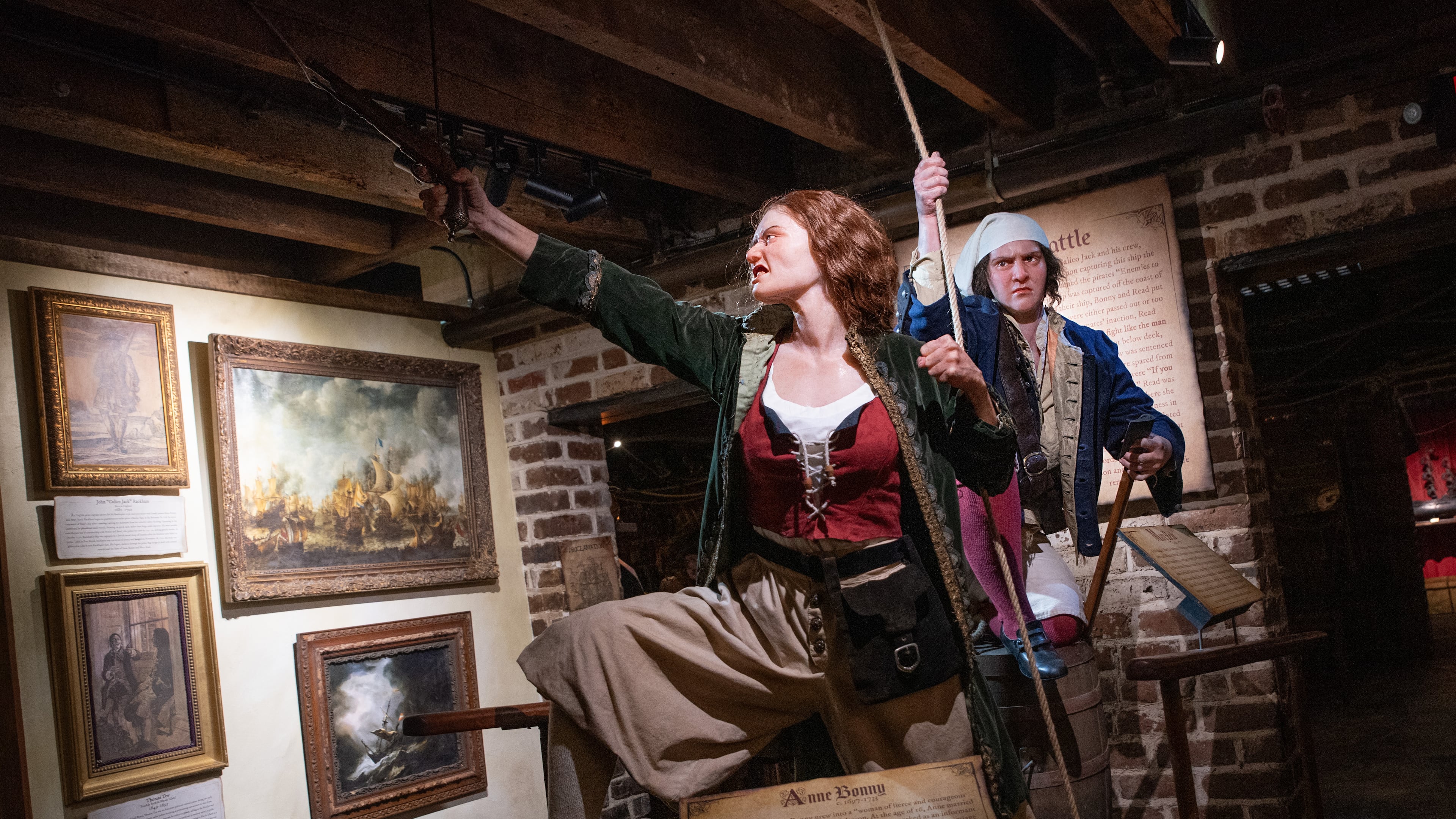 An exhibit in the Savannah Pirates and Treasure Museum depicts Anne Bonny (center) and Mary Read, who were among the few female pirates during the Golden Age of Piracy. (Courtesy of Travis Spagenhurg)