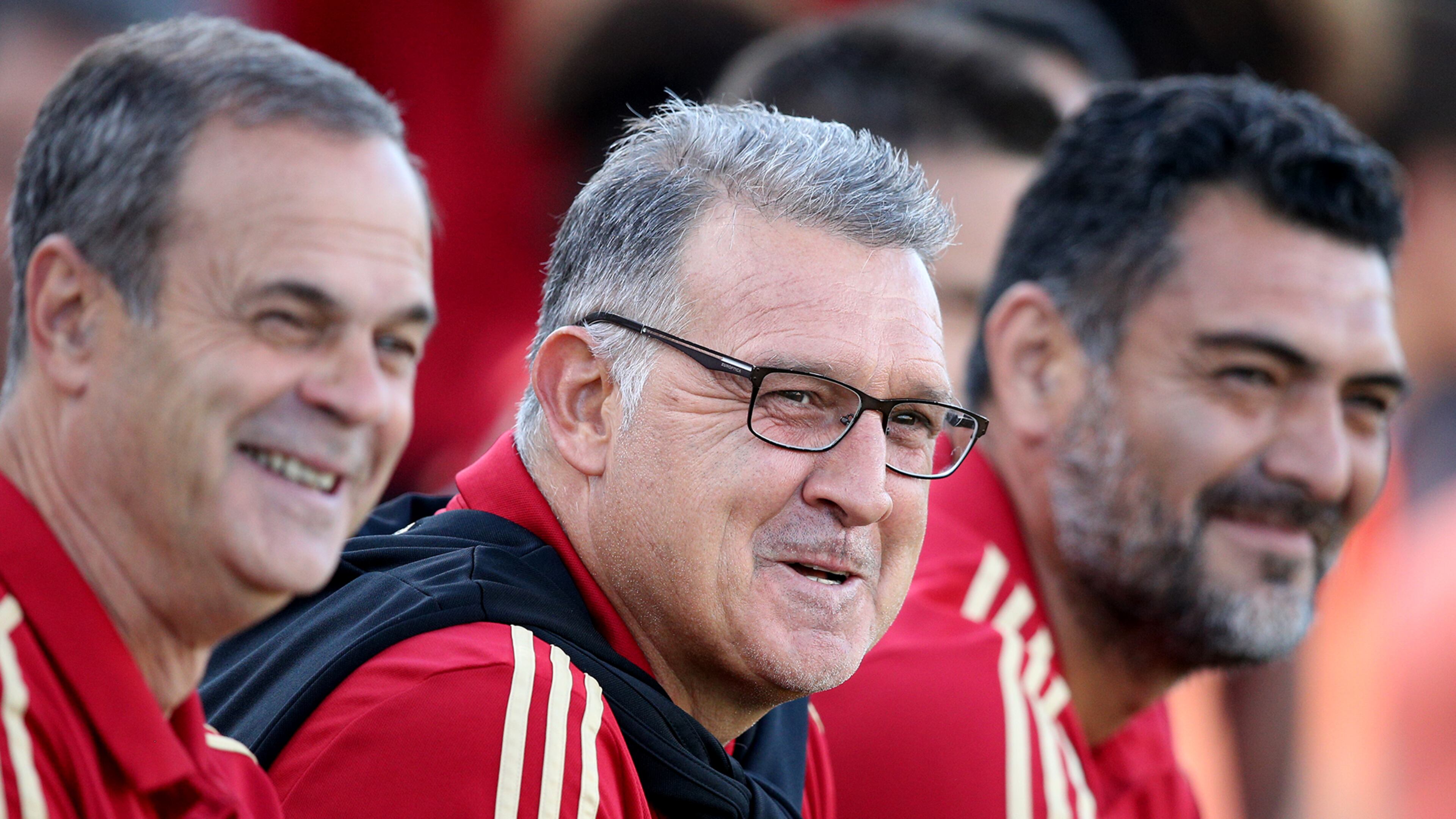 Gerardo Martino, center, has at most six more games left as Atlanta United's manager. That's if all goes as the club and the fans hope. (Curtis Compton/ccompton@ajc.com)