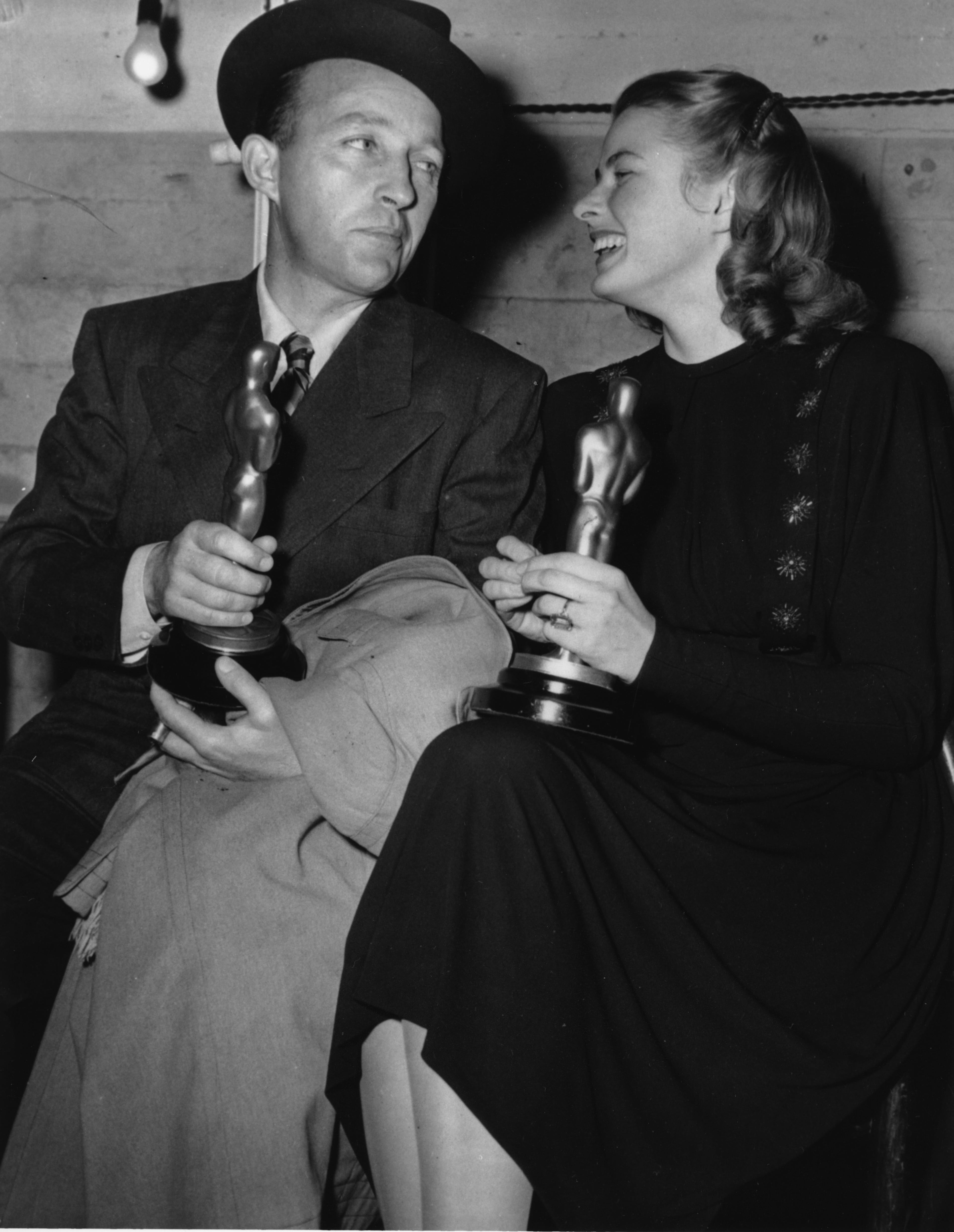 Bing Crosby and Ingrid Bergman share a laugh in Hollywood on March 6, 1944, at the Academy Awards after they each won an Oscar. Bergman won for her performance in "Gaslight," and Crosby won for his role in "Going My Way."