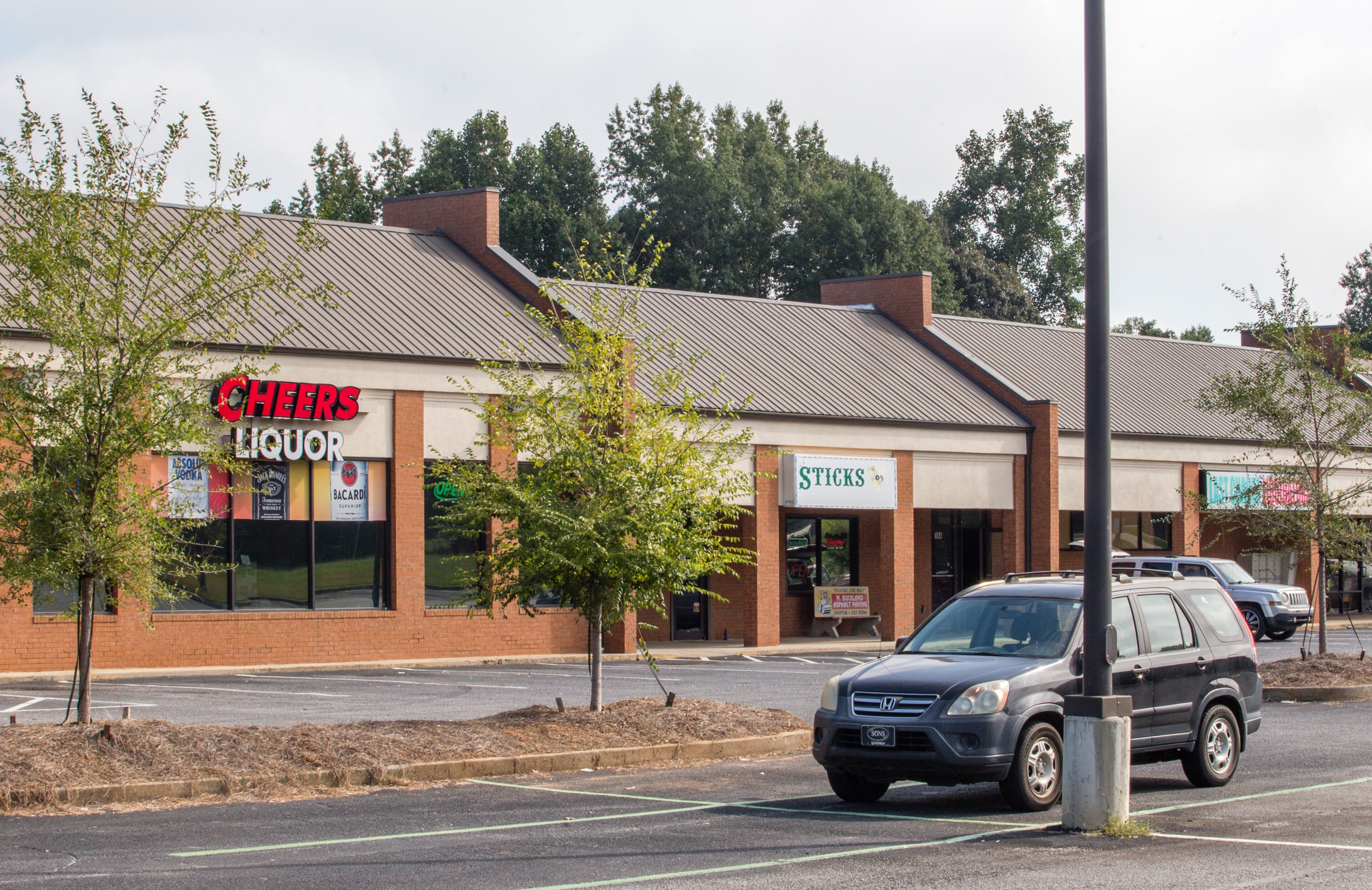 The owner of Exquisite Hair Salon says that landlord Mickey Boothe reduced her rent by $250 one month, but has since asked for full payment. “He said he’s got bills to pay too,” she said. (Jenni Girtman for The Atlanta Journal-Constitution)